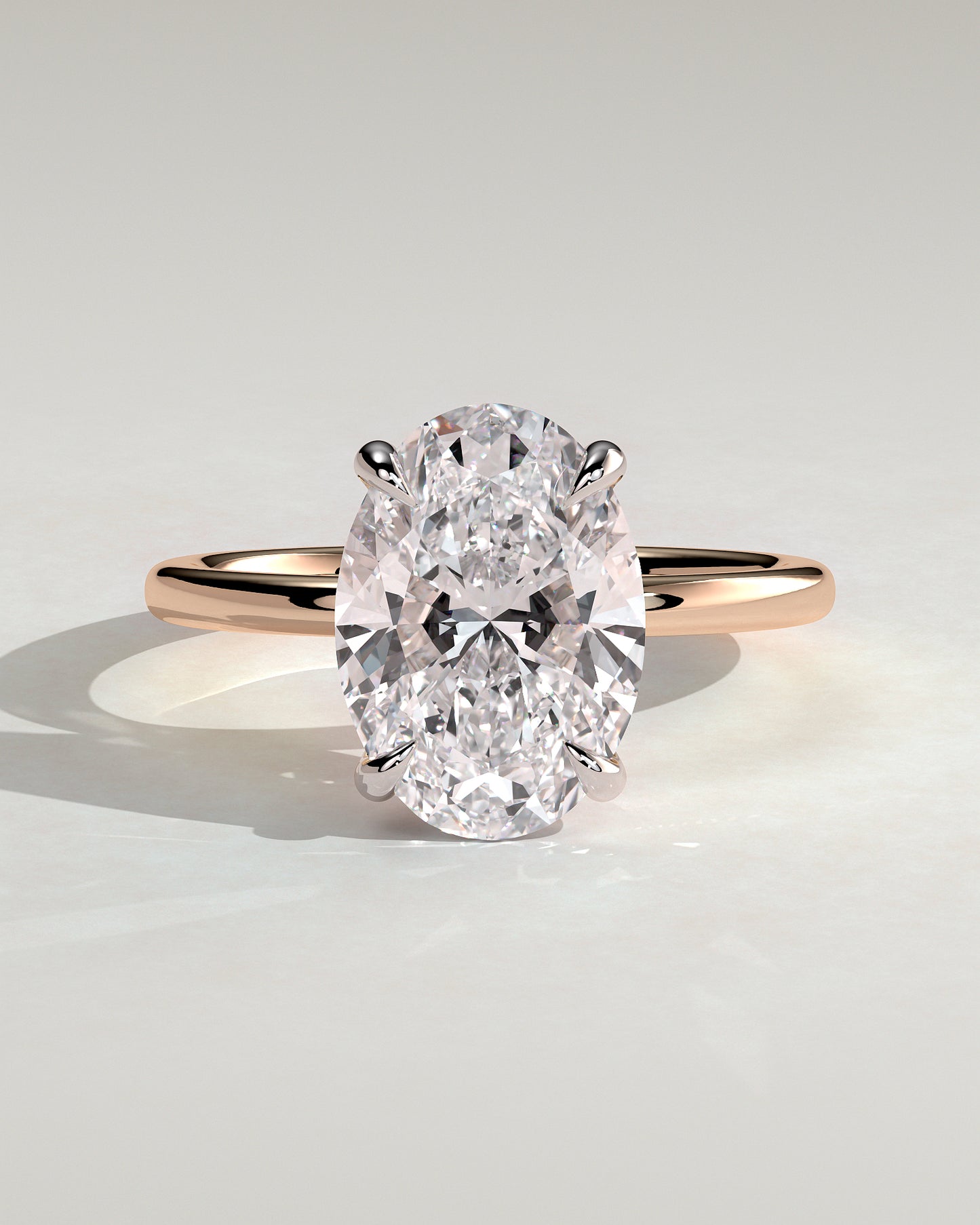 Daisy - Classic Oval Claw Solitaire Engagement Ring - Rose Two-Tone