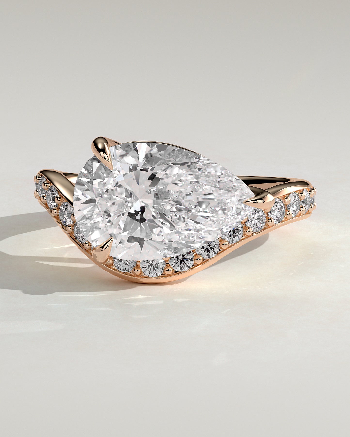 Eliza - Pear Claw Solitaire with Bead Set Pave Wave Band and East West Setting Engagement Ring - Rose Gold