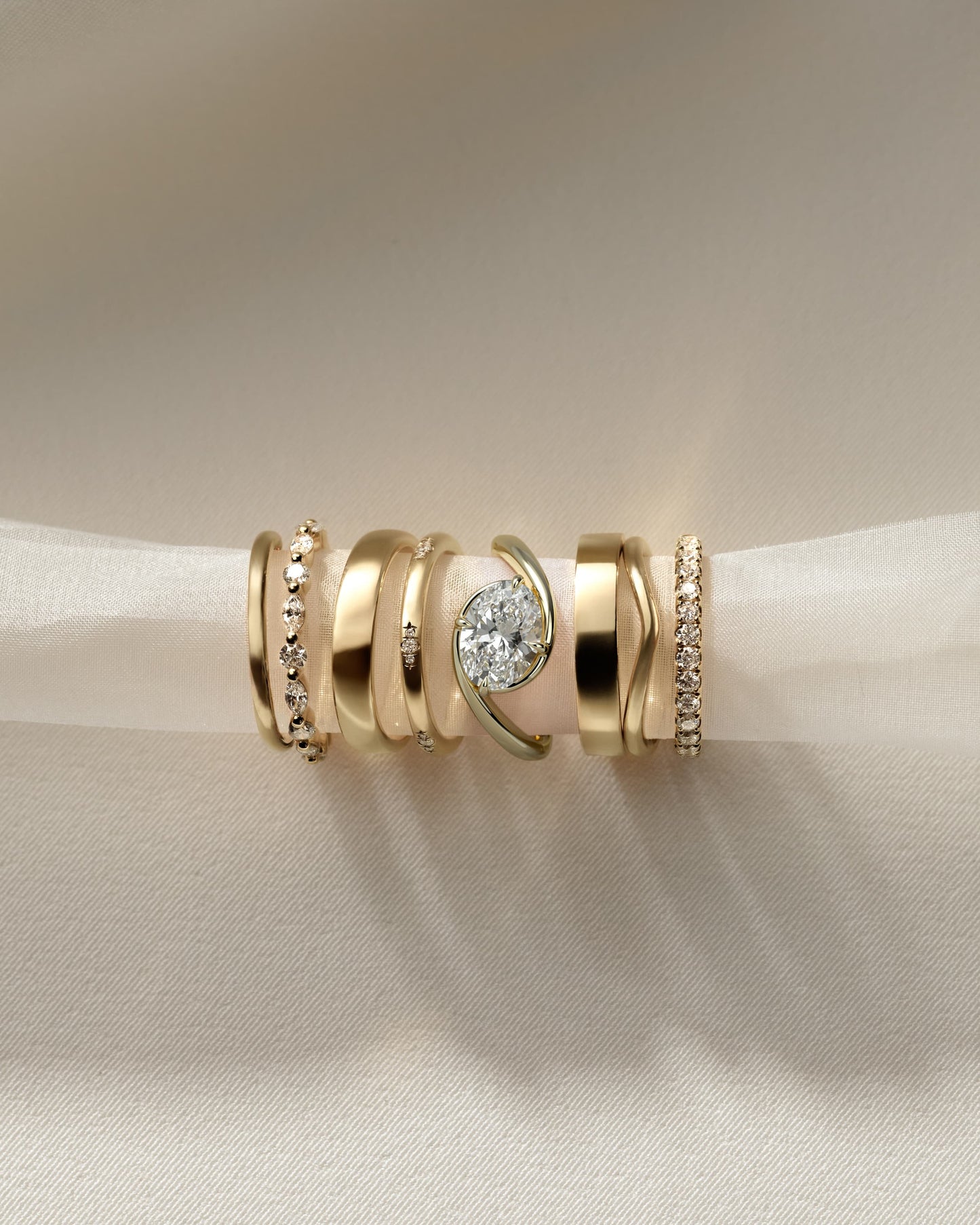 Casey - Oval East West Claw Solitaire with Bypass Band Engagement Ring - Yellow Gold