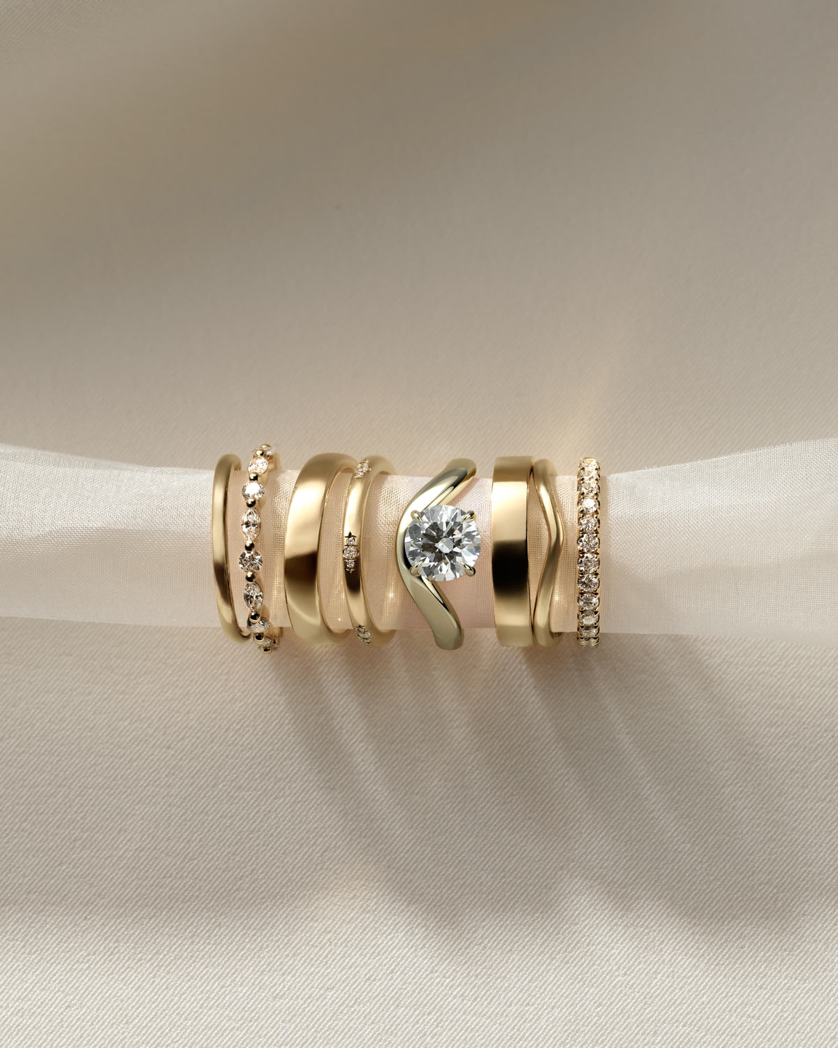 Charlotte - Round East West Claw Solitaire with Wave Band Engagement Ring - Yellow Gold