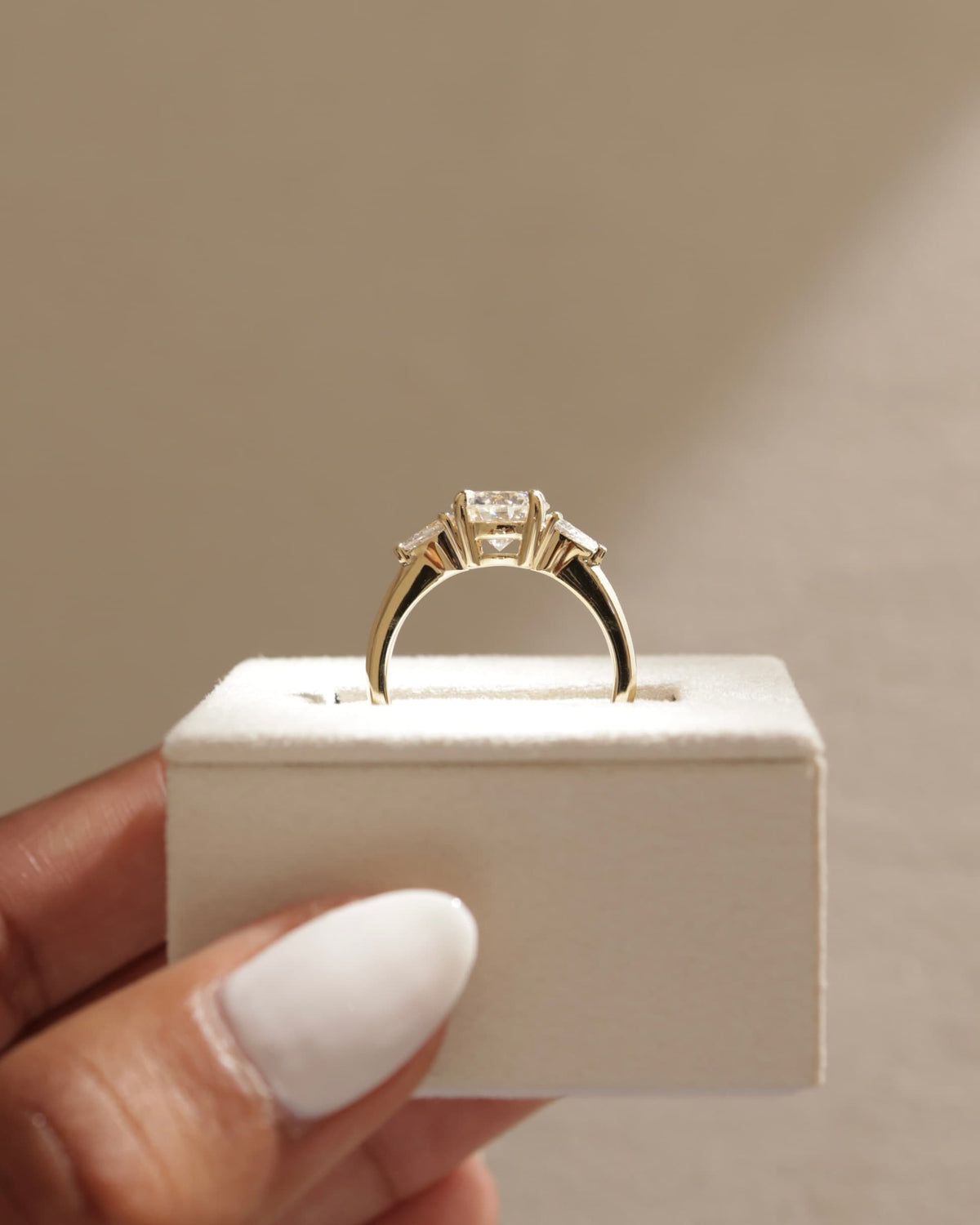 Halle - Round Claw Trilogy with Pear Side Stones and Knife Edge Band Engagement Ring - Yellow Gold