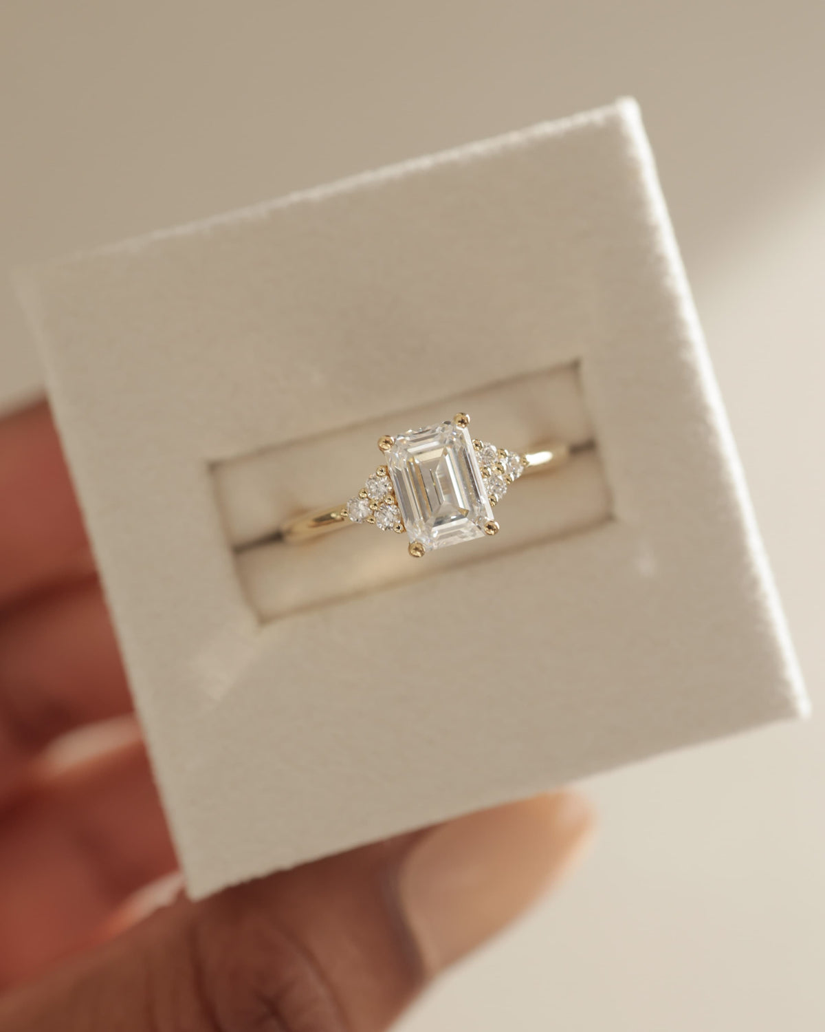 Martina - Emerald Claw Solitaire with Round Shoulder Stones Engagement Ring - Platinum