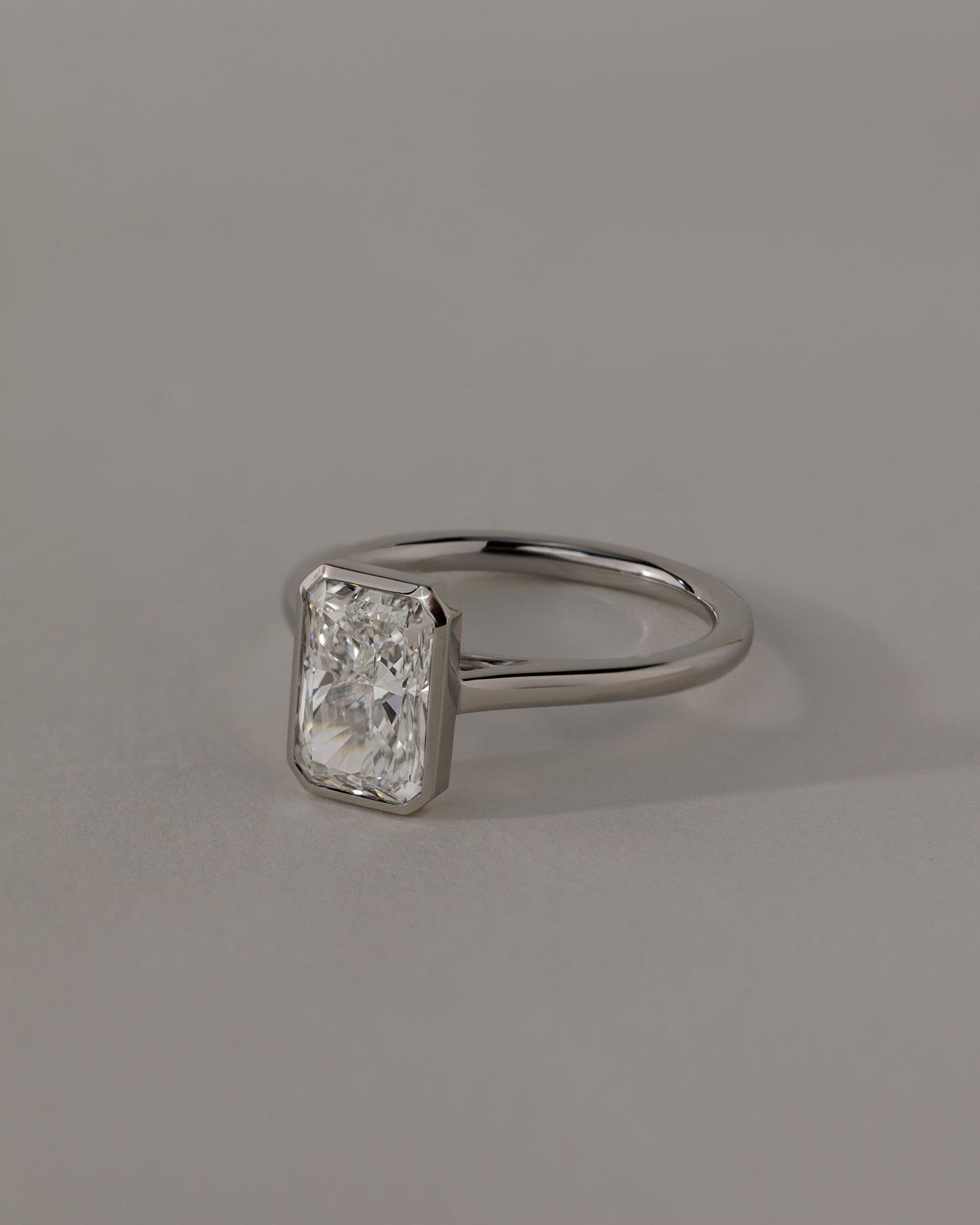 Zoe - Radiant Bezel Solitaire with Open Cathedral High Setting Engagement Ring - Rose Gold
