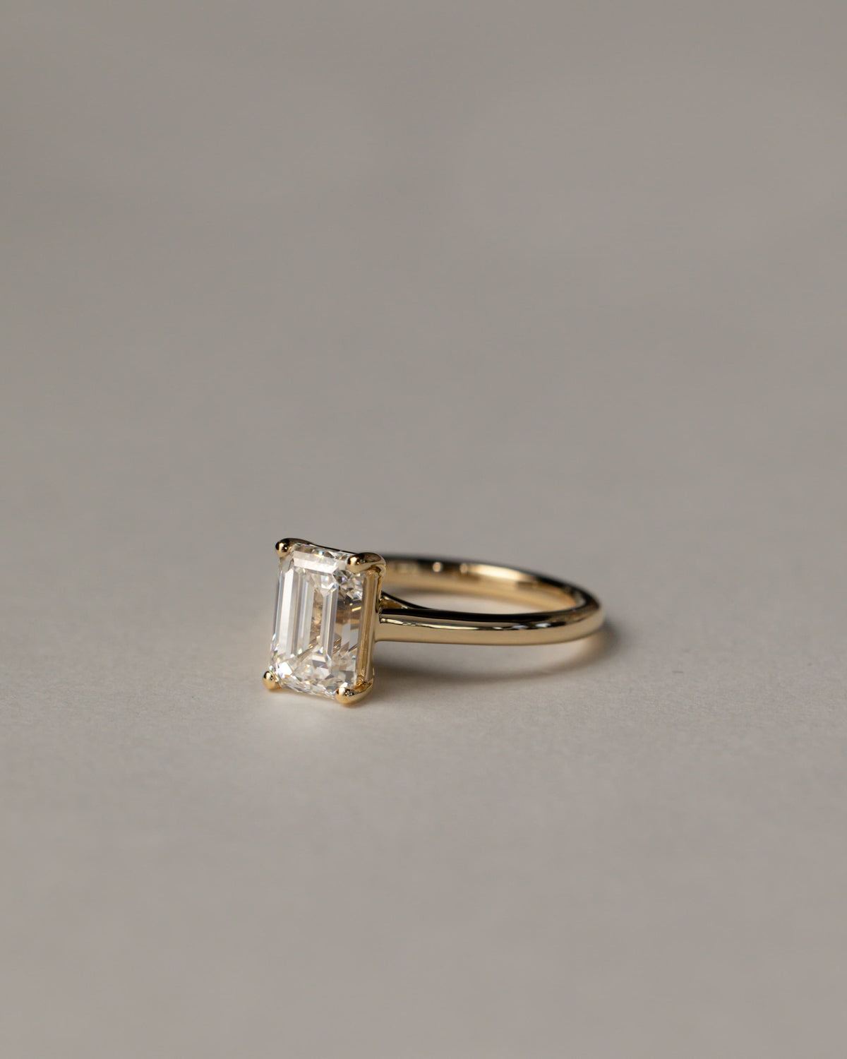 Nora - Emerald Claw Solitaire with Spiral Gallery and Cathedral Low Setting Engagement Ring - Platinum