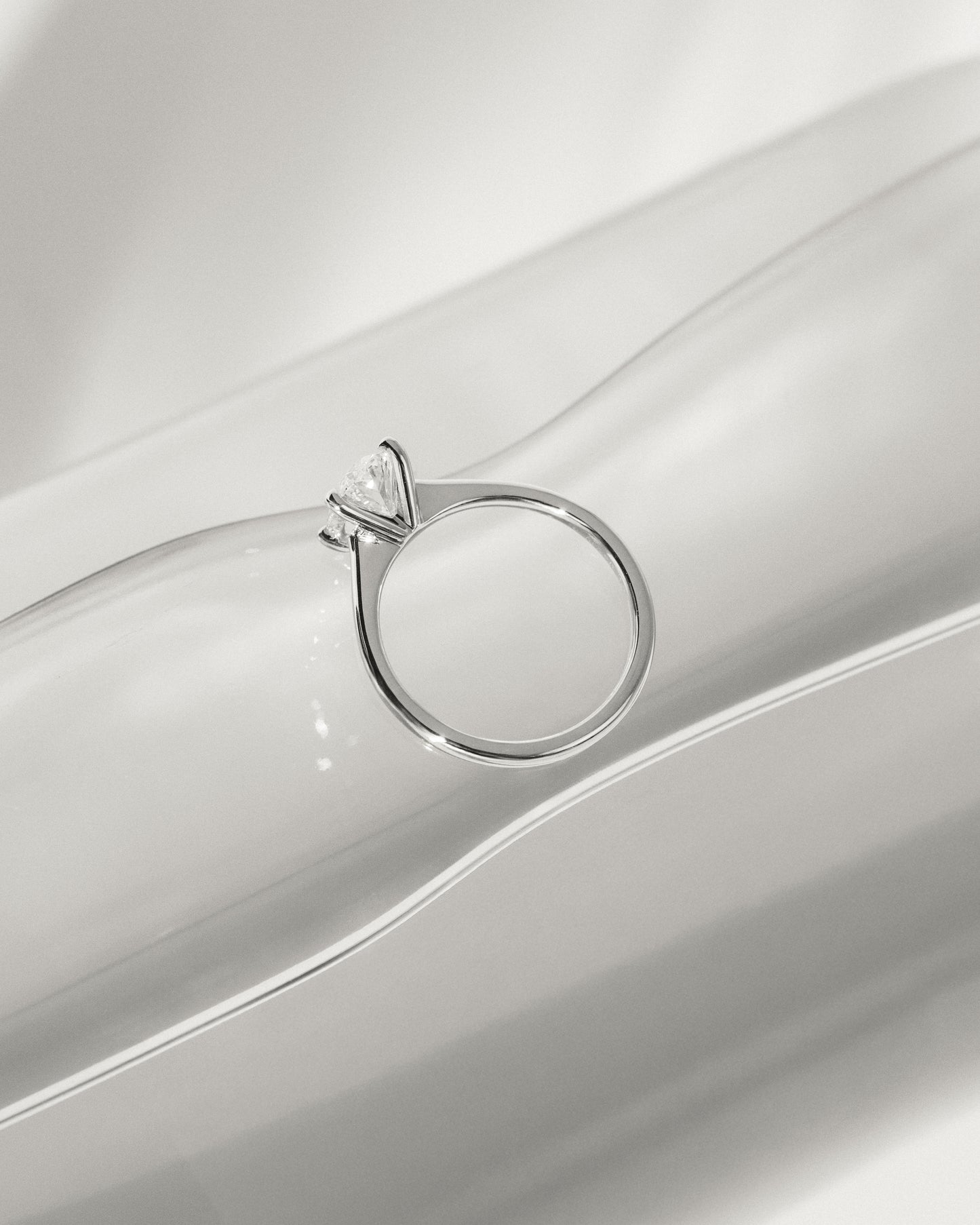 Emily - Oval Claw Solitaire with Pinched Tapered Band and Cathedral Low Setting Engagement Ring - Platinum - Lifestyle