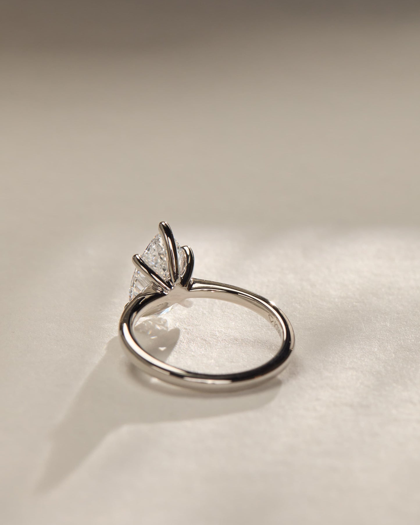 Aspen - Pear Claw Solitaire with Pinched Tapered Band and Cathedral Low Setting Engagement Ring - Rose Gold
