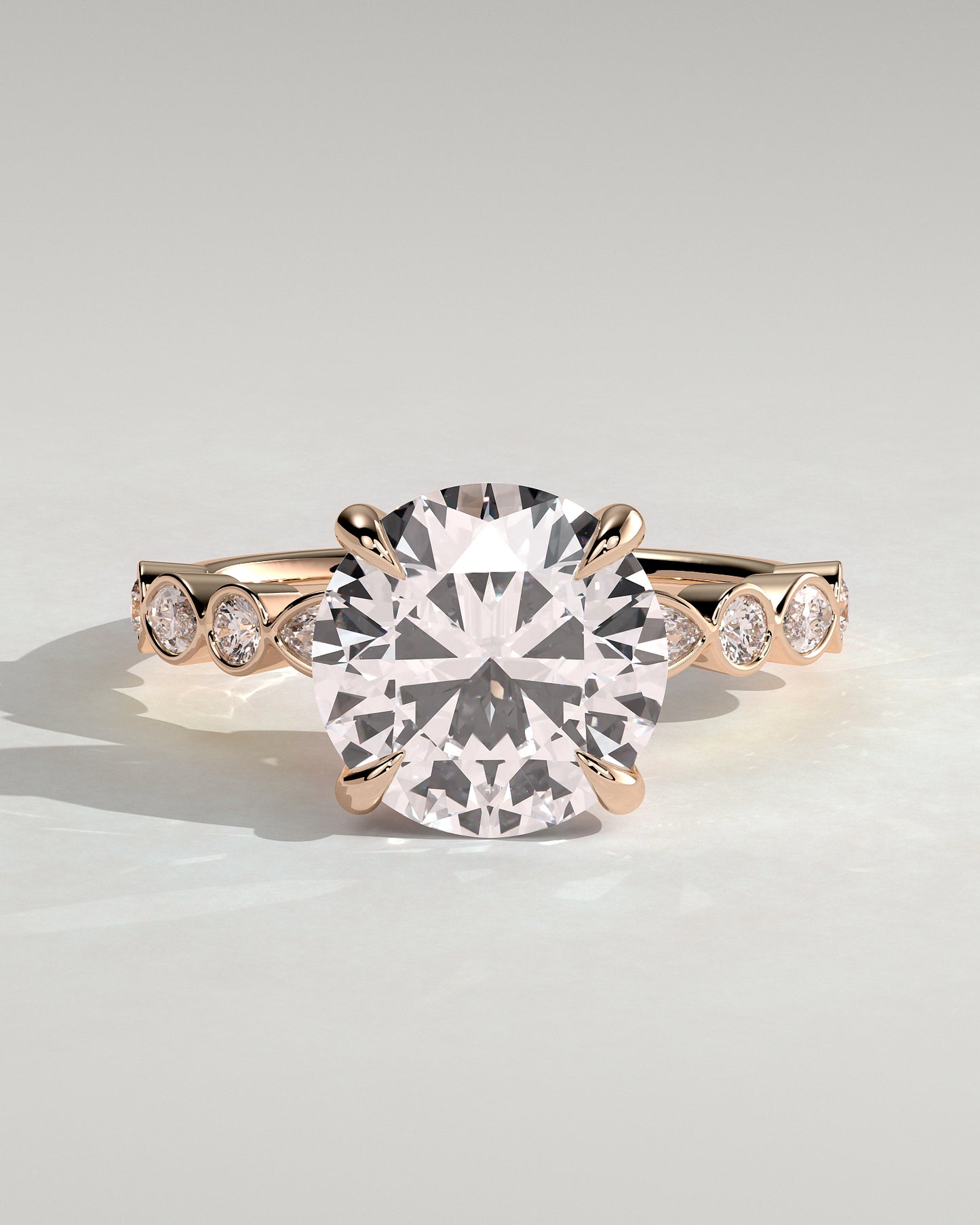 Cartia - Round Claw Solitaire with Round-Marquise Bezel Accent Stones Engagement Ring - Rose Gold