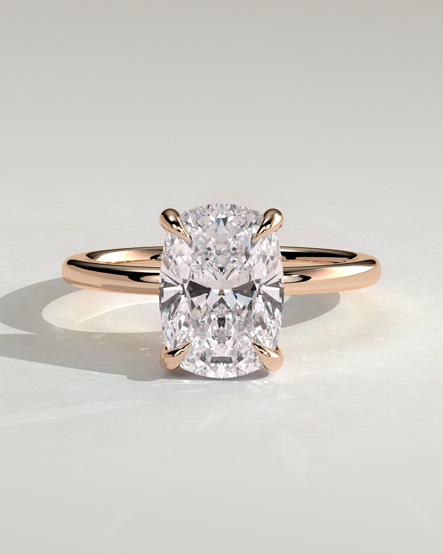 Ava - Elongated Cushion Claw Solitaire with Hidden Halo Engagement Ring - Rose Gold