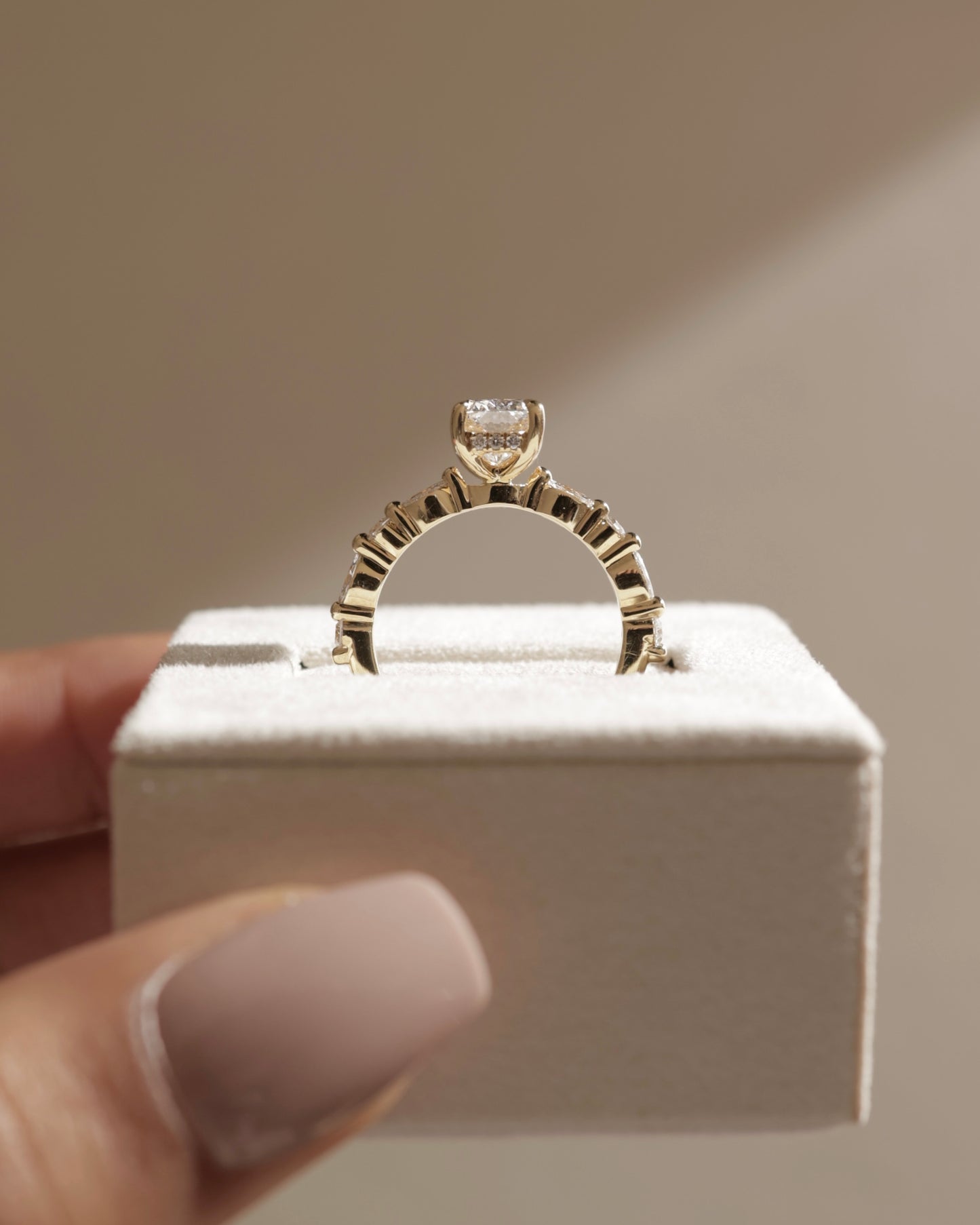 Cali - Elongated Cushion Claw Solitaire with Marquise-Round Accent Stones and Hidden Halo Engagement Ring - Rose Two-Tone - Lifestyle