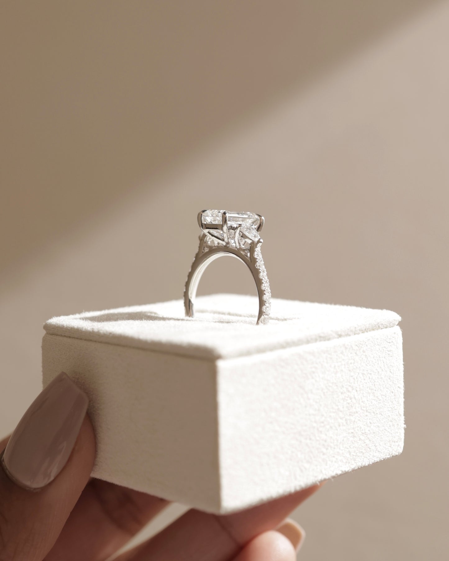 Autumn - Emerald Claw Trilogy with Pear Side Stones and Pave Band Engagement Ring - Rose Two-Tone - Lifestyle