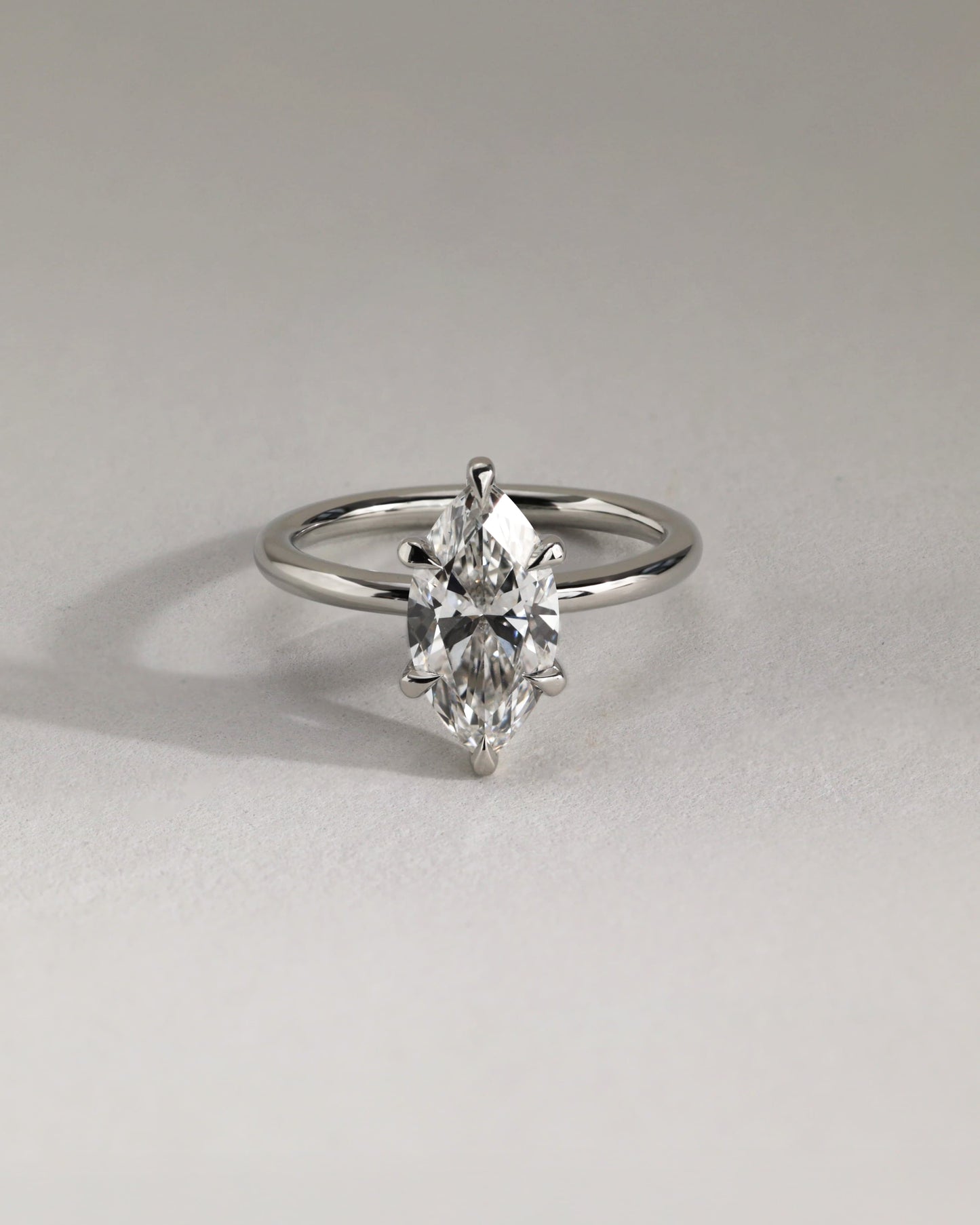 Stephanie - Marquise Claw Solitaire Engagement Ring - Yellow Two-Tone
