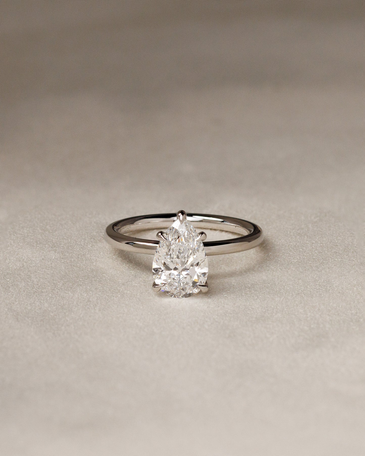 Alia - Pear Claw Solitaire Engagement Ring - Rose Two-Tone - Lifestyle
