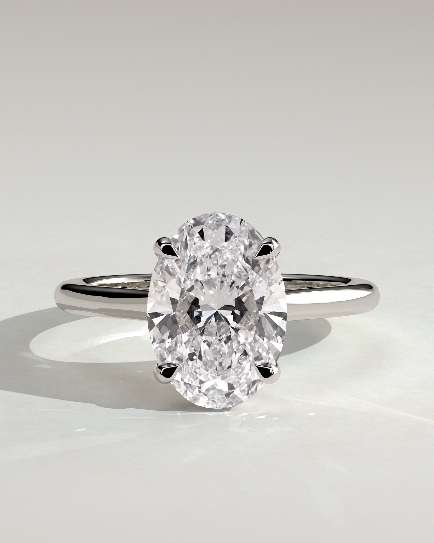 Hilary - Oval Claw Solitaire with Cathedral High Setting Engagement Ring - Platinum