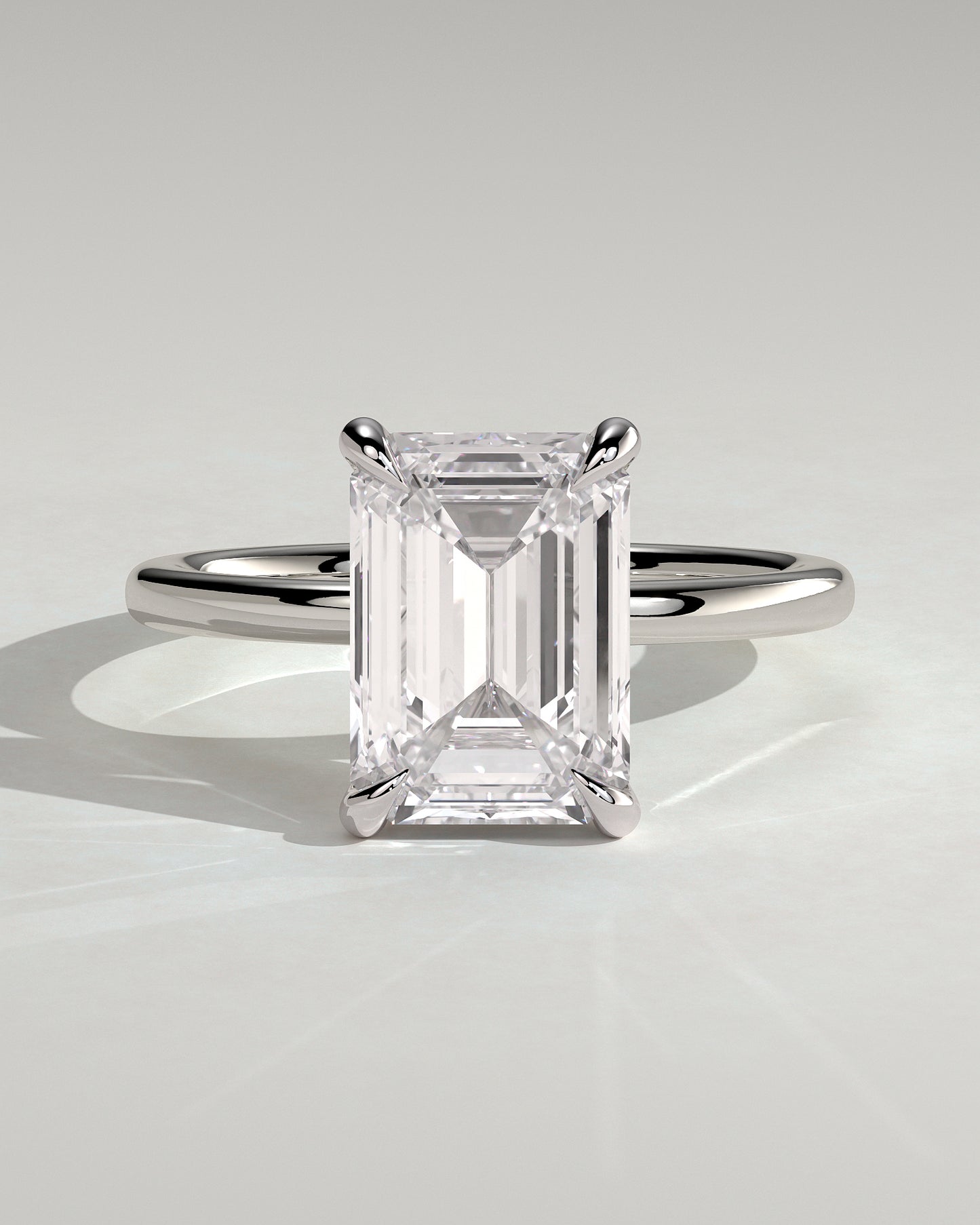 Alina - Emerald Claw Solitaire Engagement Ring - Platinum