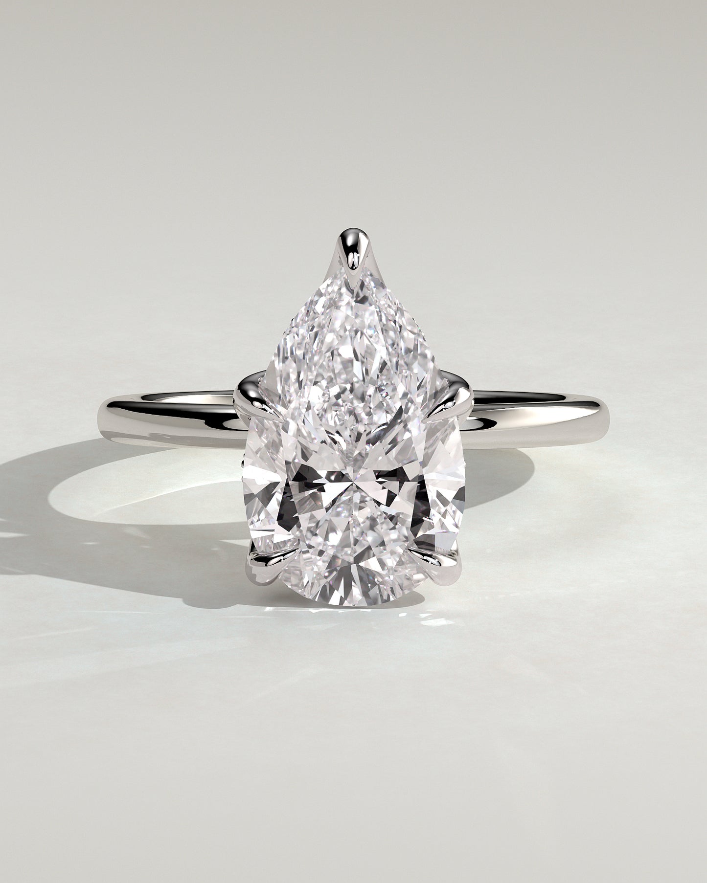 Blossom - Pear Claw Solitaire with Petal Gallery and Accented Tiara Detail Engagement Ring - Platinum