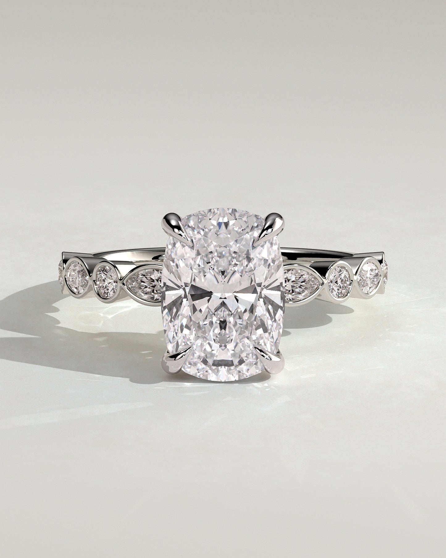 Carrie - Elongated Cushion Claw Solitaire with Round-Marquise Bezel Accent Stones Engagement Ring - Platinum