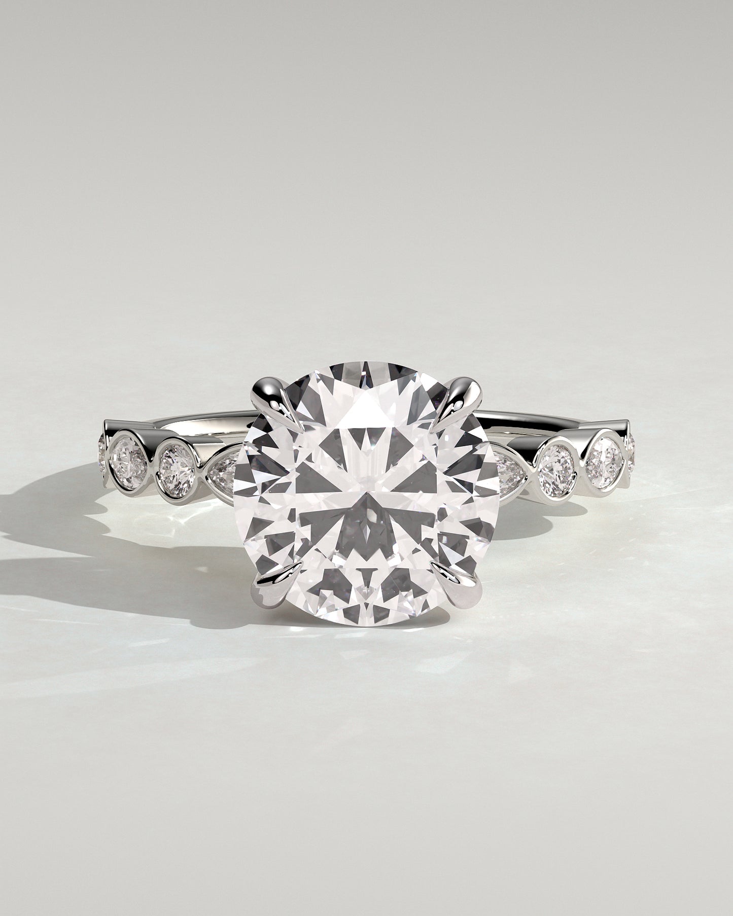 Cartia - Round Claw Solitaire with Round-Marquise Bezel Accent Stones Engagement Ring - Platinum