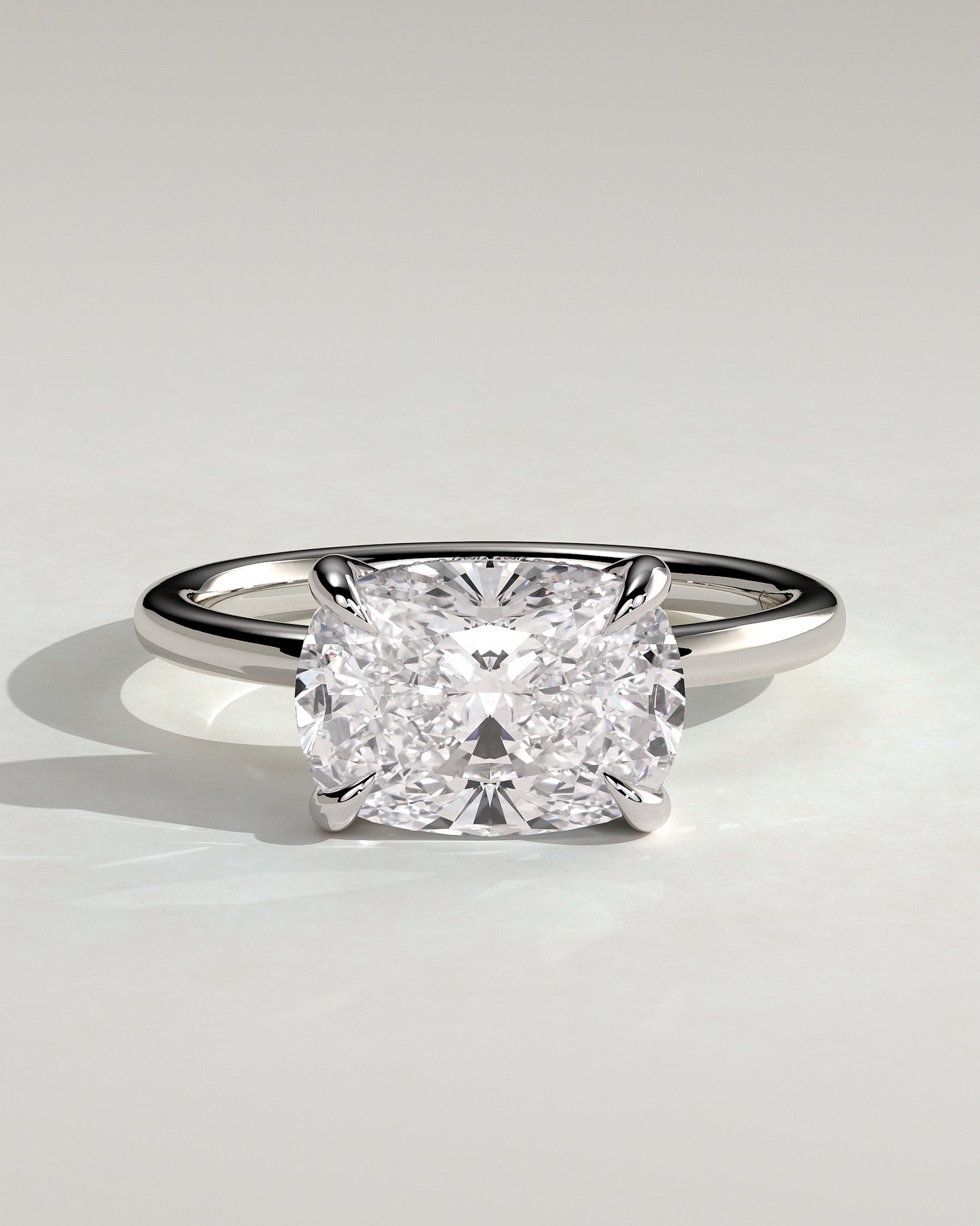 Frida - Elongated Cushion East West Claw Solitaire with Hidden Halo Engagement Ring - Platinum