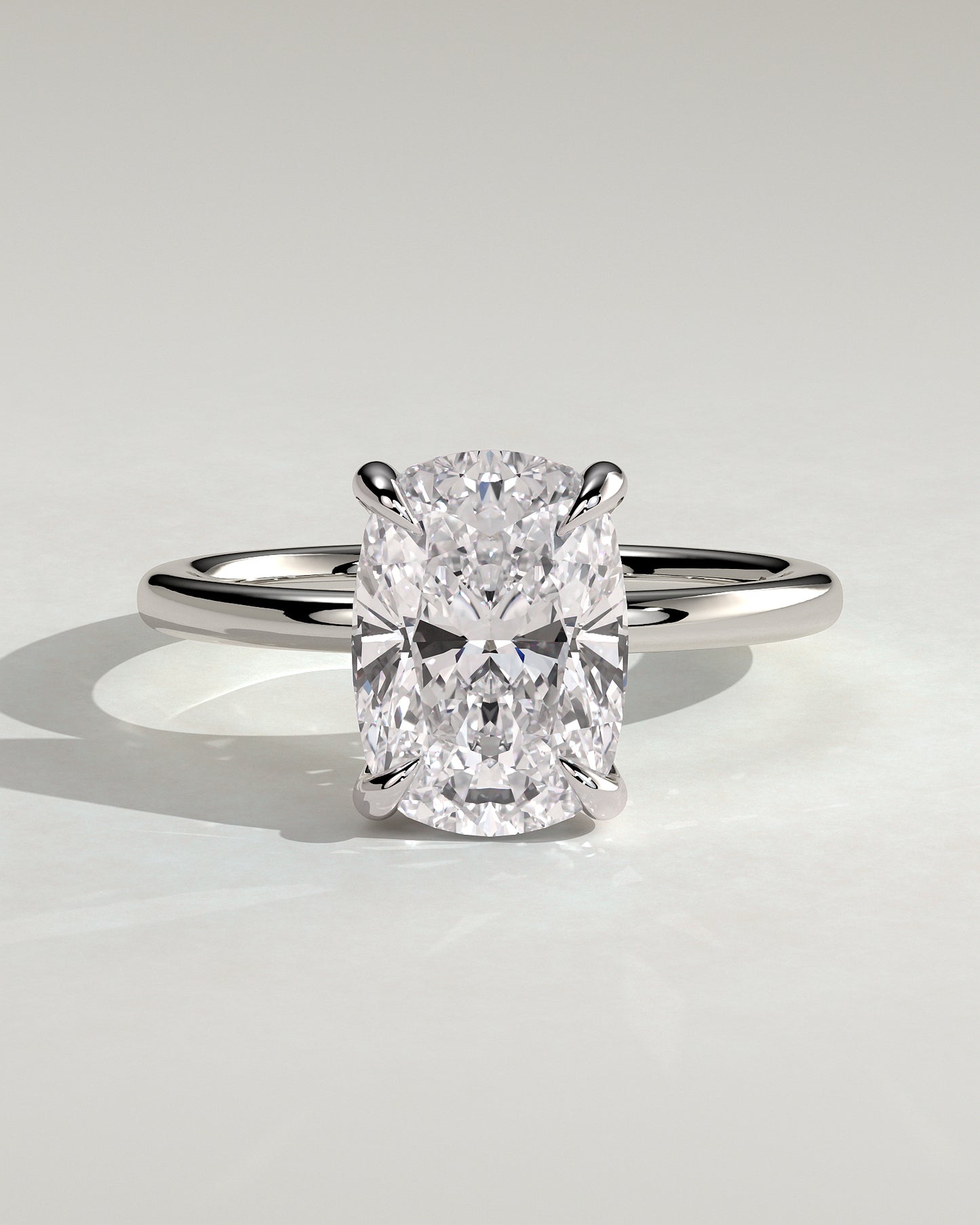 Ava - Elongated Cushion Claw Solitaire with Hidden Halo Engagement Ring - Platinum