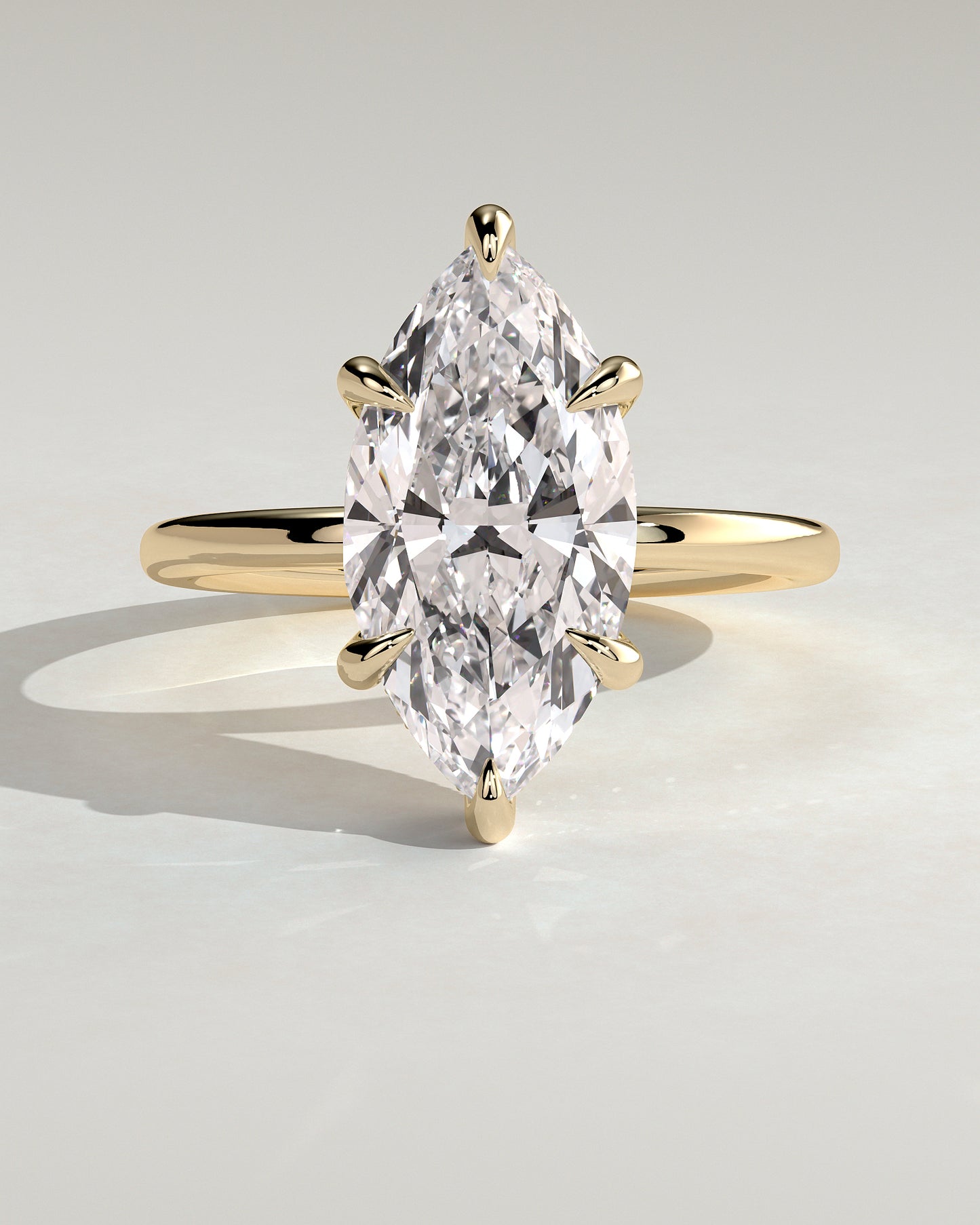 Claire - Marquise Claw Solitaire with Wrap Around Hidden Halo Engagement Ring - Yellow Gold