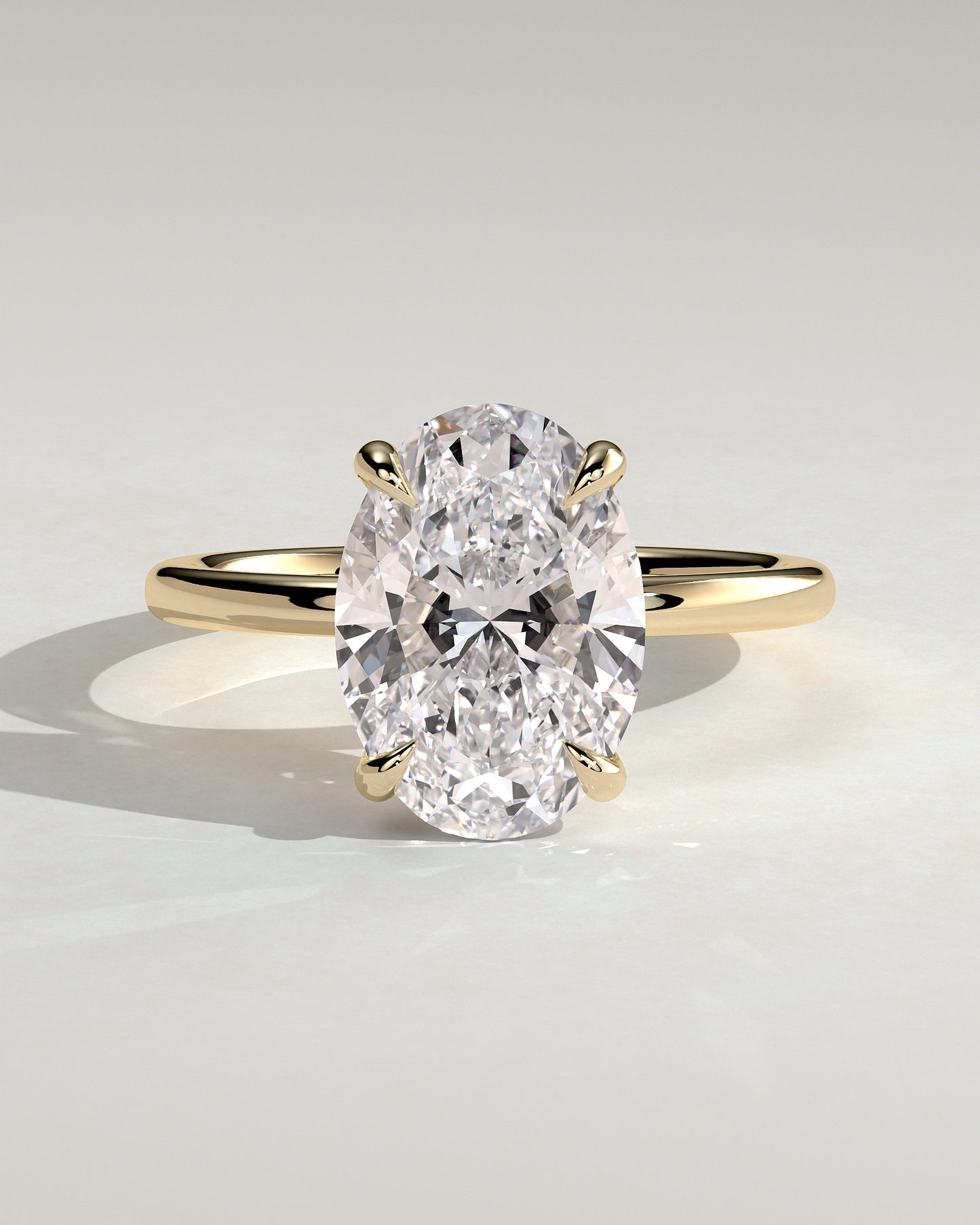 Daisy - Classic Oval Claw Solitaire Engagement Ring - Yellow Gold