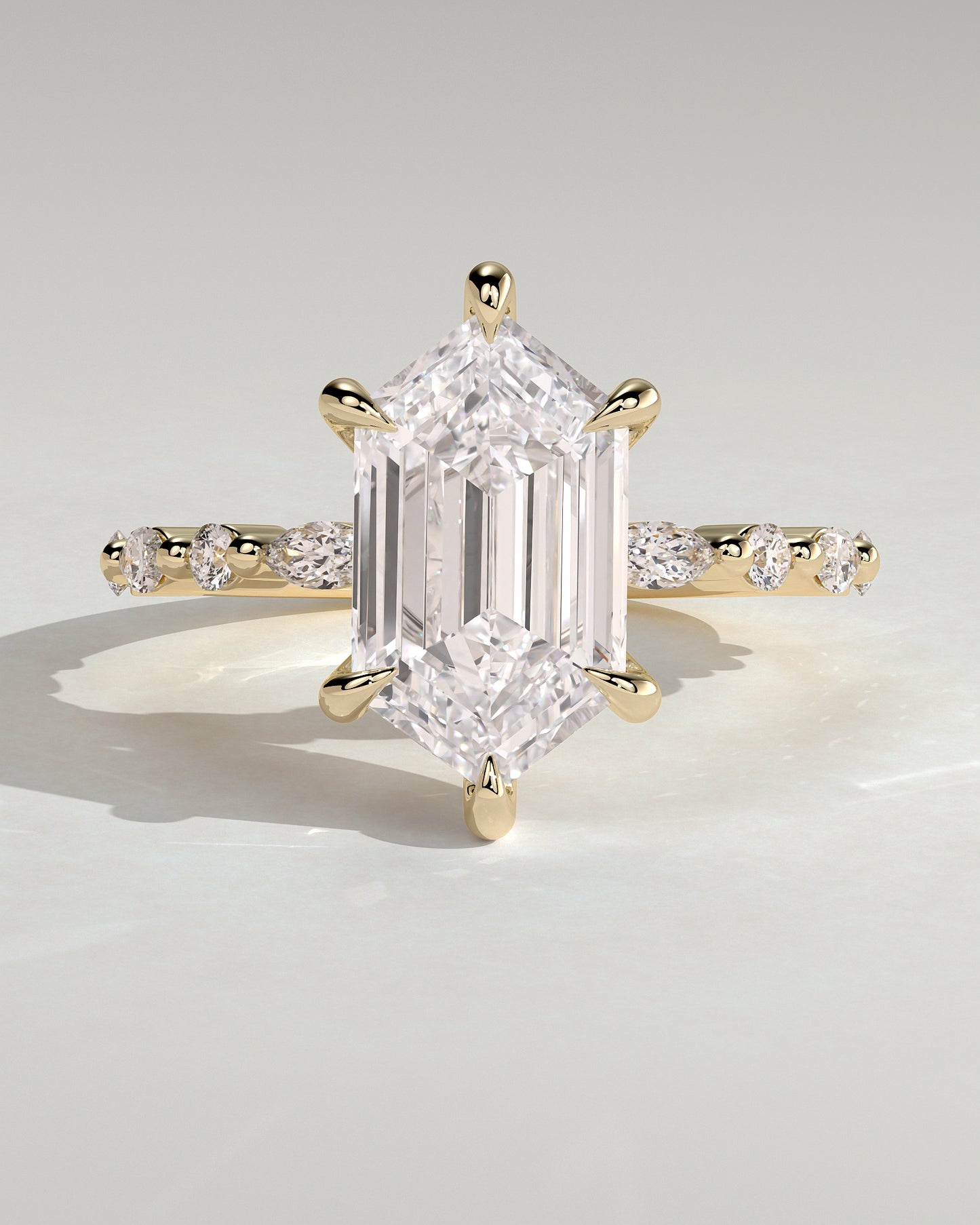 Agnes - Elongated Hexagon Claw Solitaire with Marquise and Round Accent Stones Engagement Ring - Yellow Gold