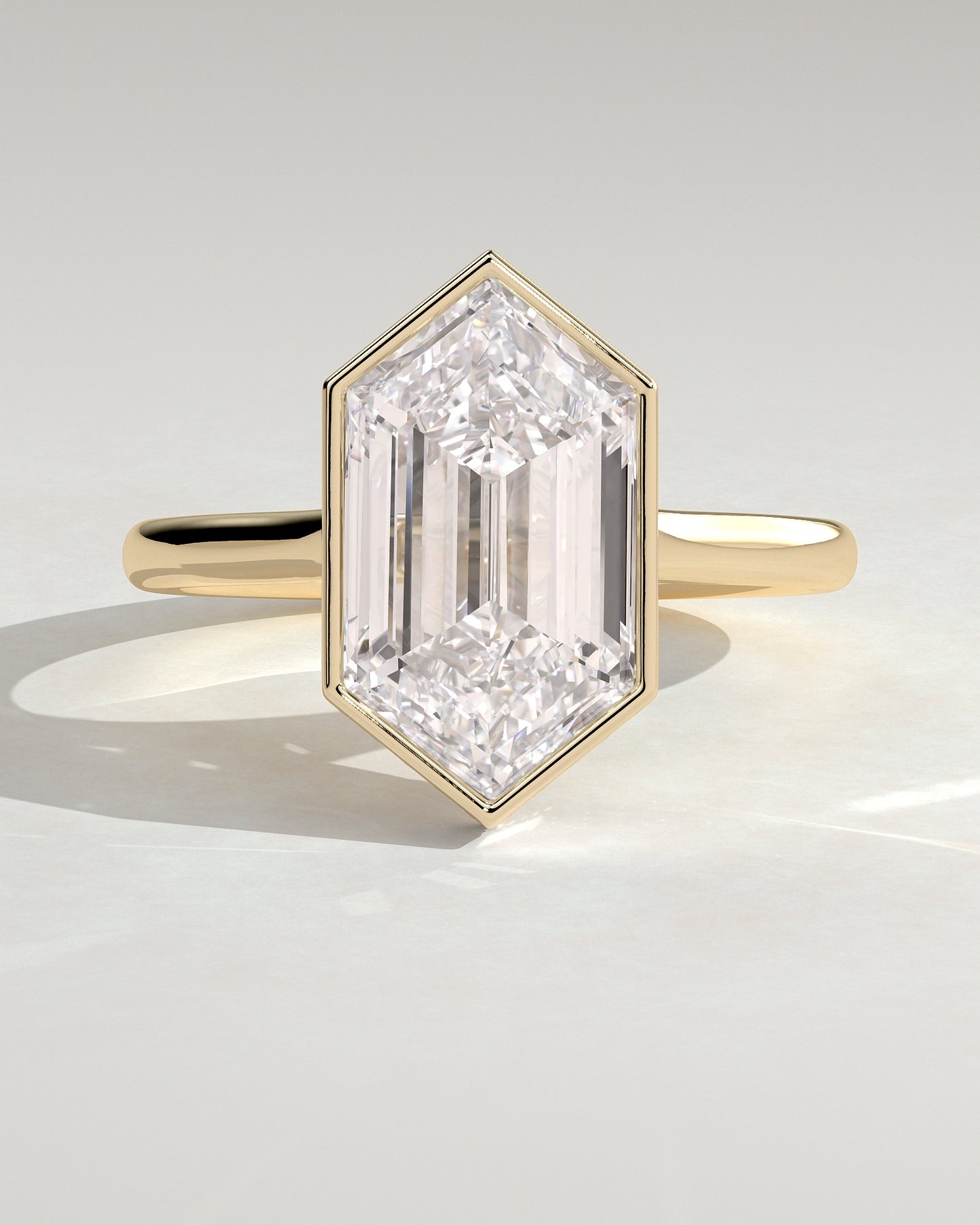 Gloria - Elongated Hexagon Bezel Solitaire with Hidden Halo and Cathedral High Setting Engagement Ring - Yellow Gold