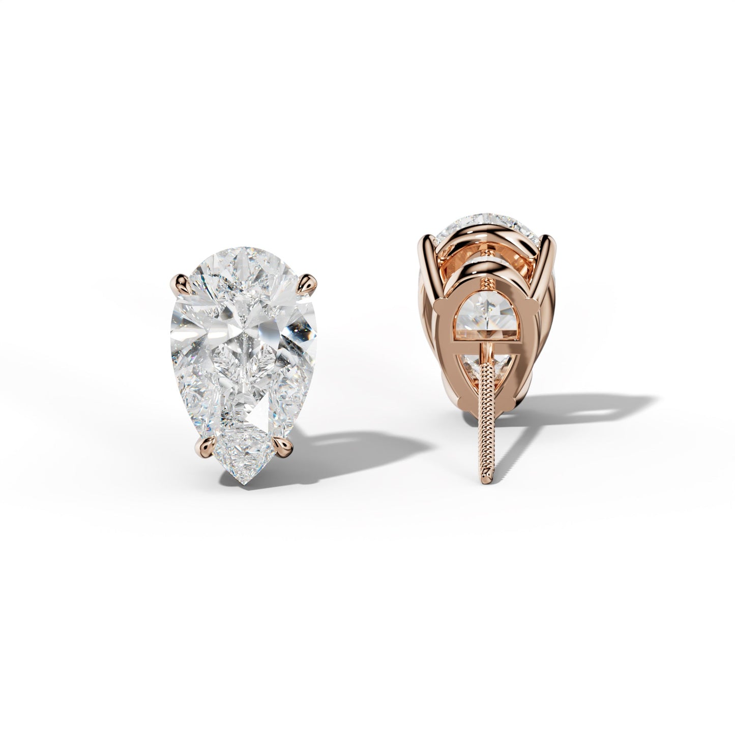 Pear Shape Diamond Stud Earrings With Four Claw Prongs - 1/2 - Platinum 950