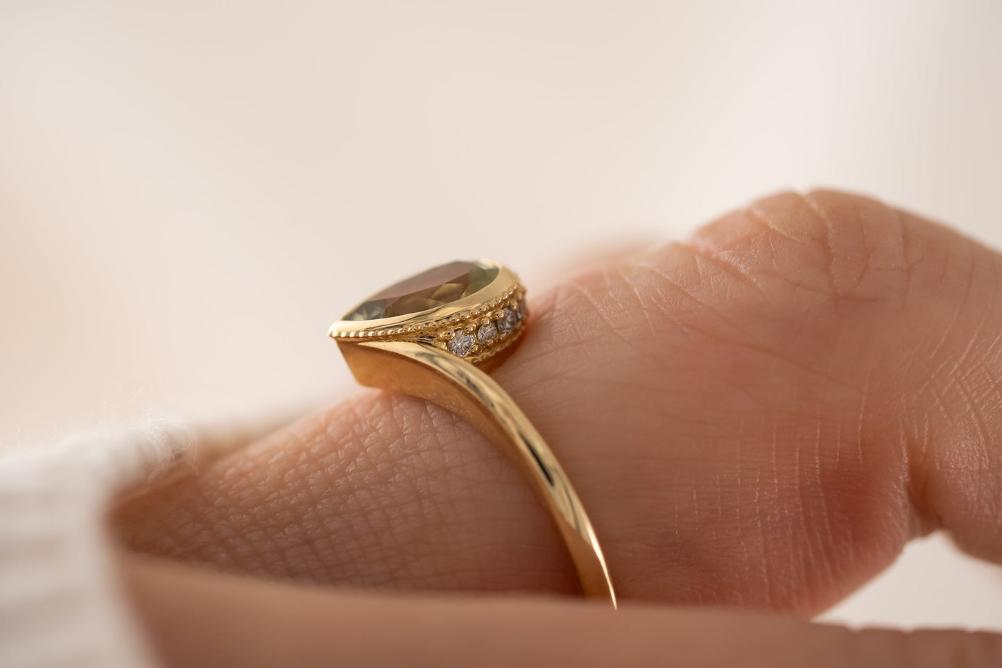 The Contoured Sitara Ring | 1.22 CT Pear Green Sapphire