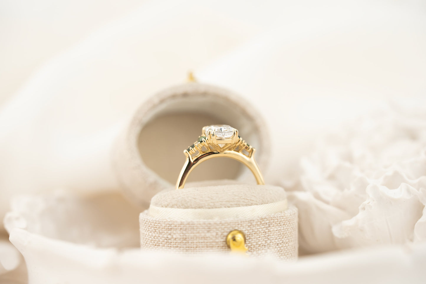 The Maeve Ring | 2.08 CT Elongated Cushion Diamond + Dark Green Sapphire Accents