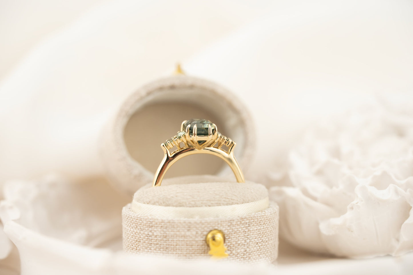 The Maeve Ring | 2.59 CT Emerald Cut Teal Sapphire + Green Sapphire Accents