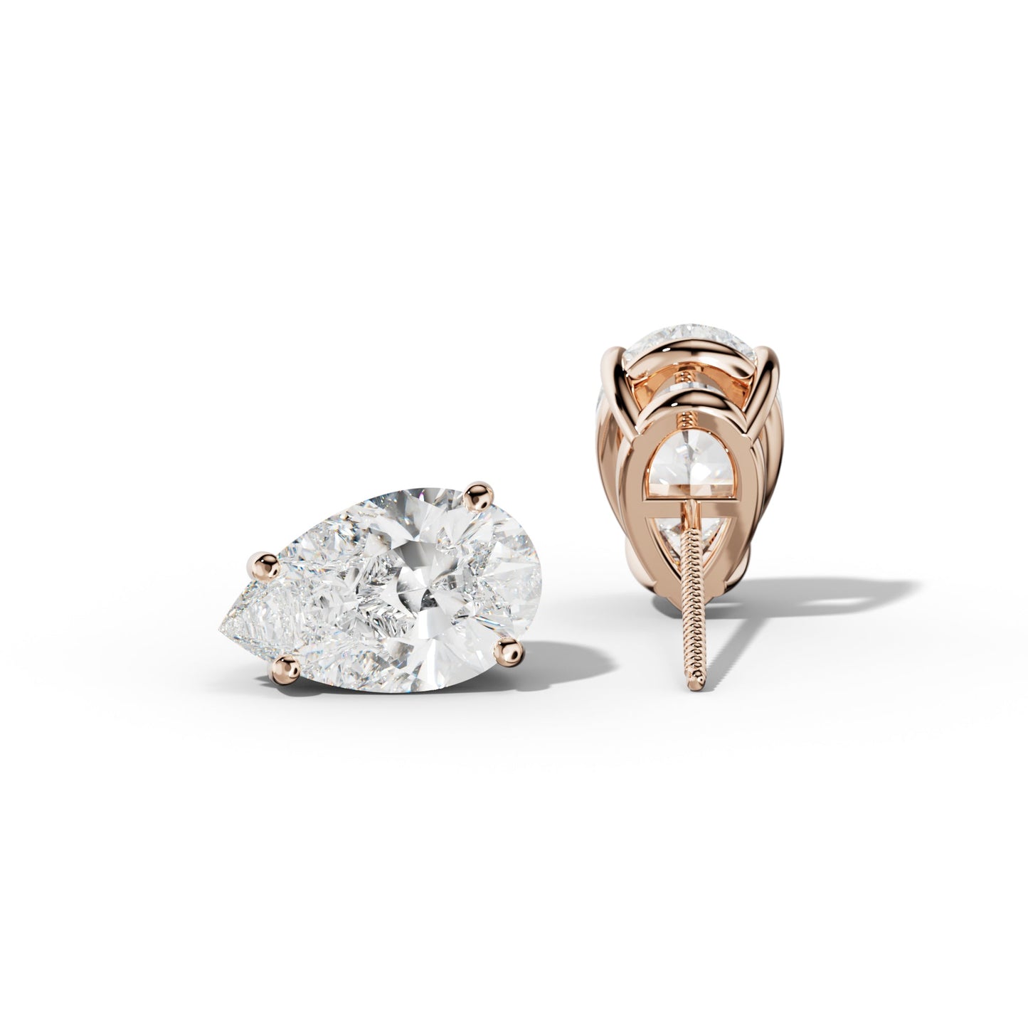 Pear Shape Diamond Stud Earrings With Classic Four Prongs - 1/2 - Platinum 950