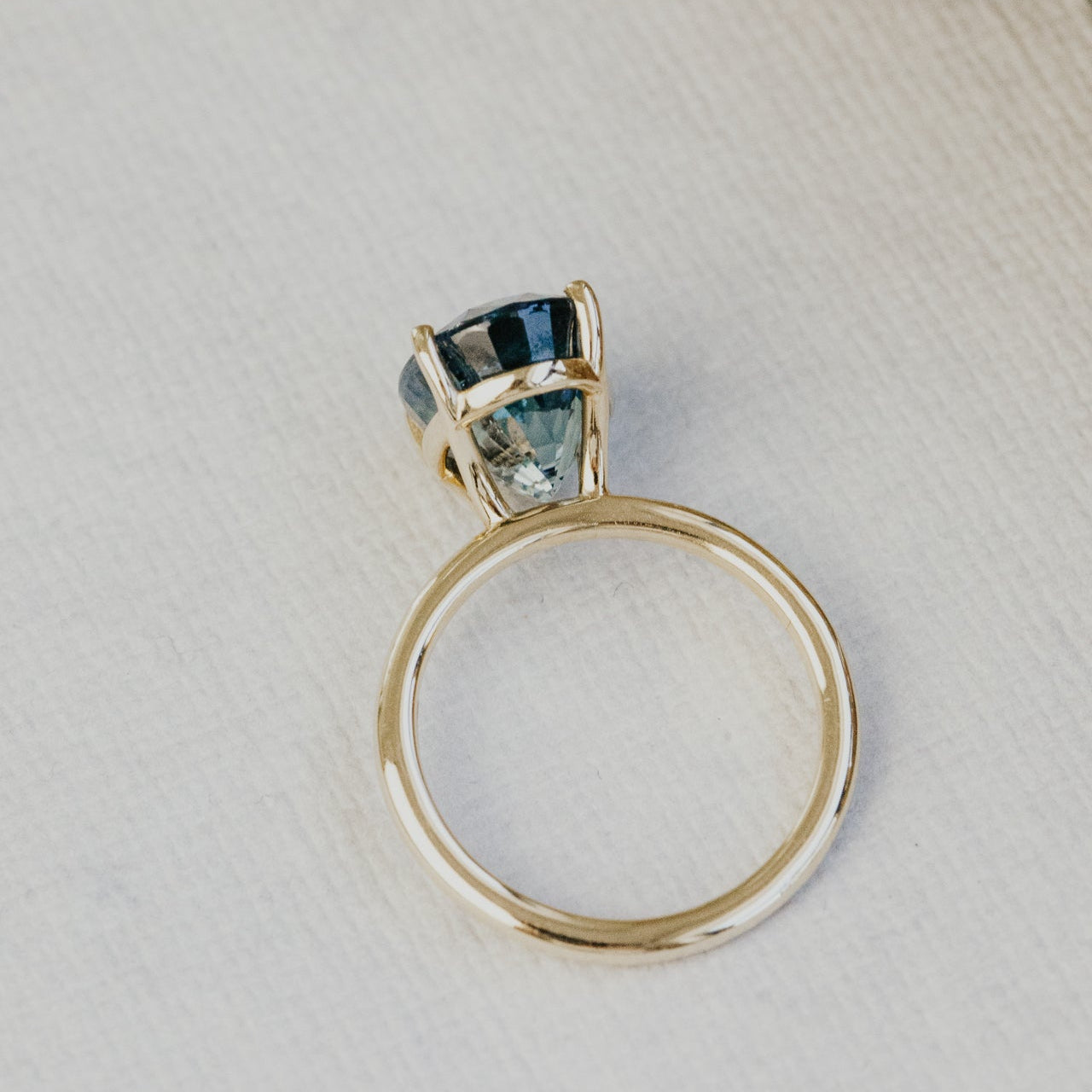 The Maeve Oval Teal Sapphire Solitaire