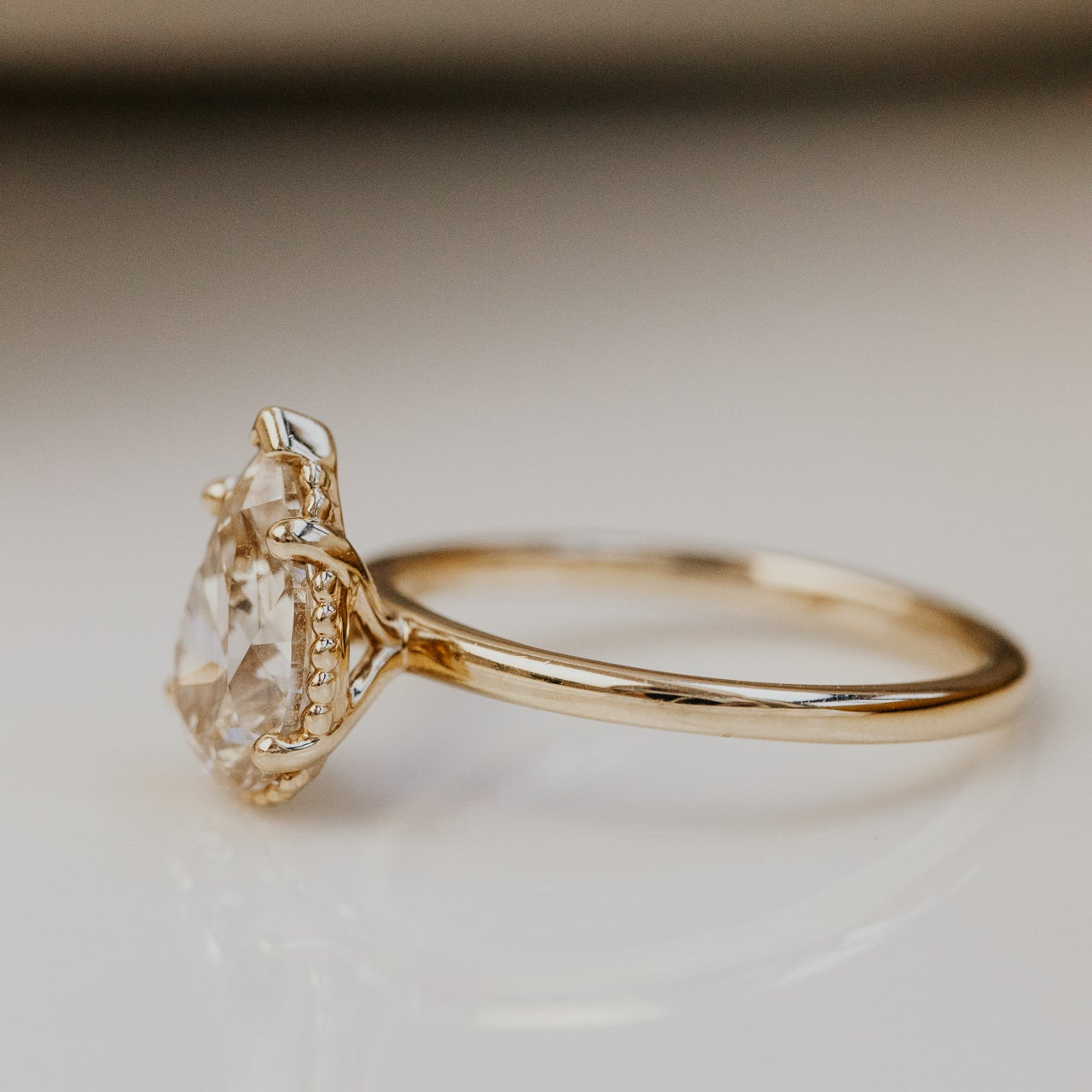 The Charlotte Pear Champagne Diamond Solitaire