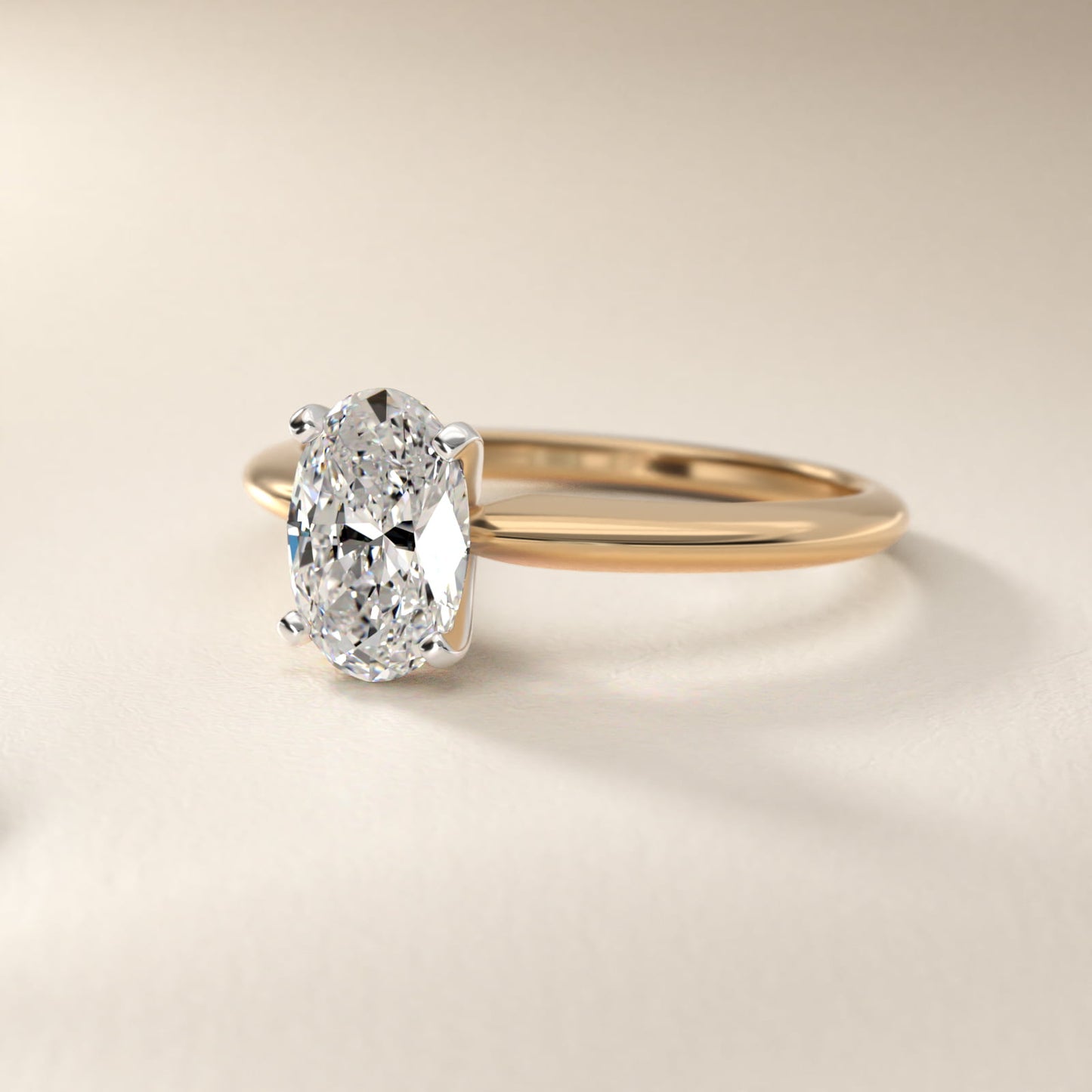 Classic Four Prong Solitaire Engagement Ring in 14K Yellow Gold - Oval Center