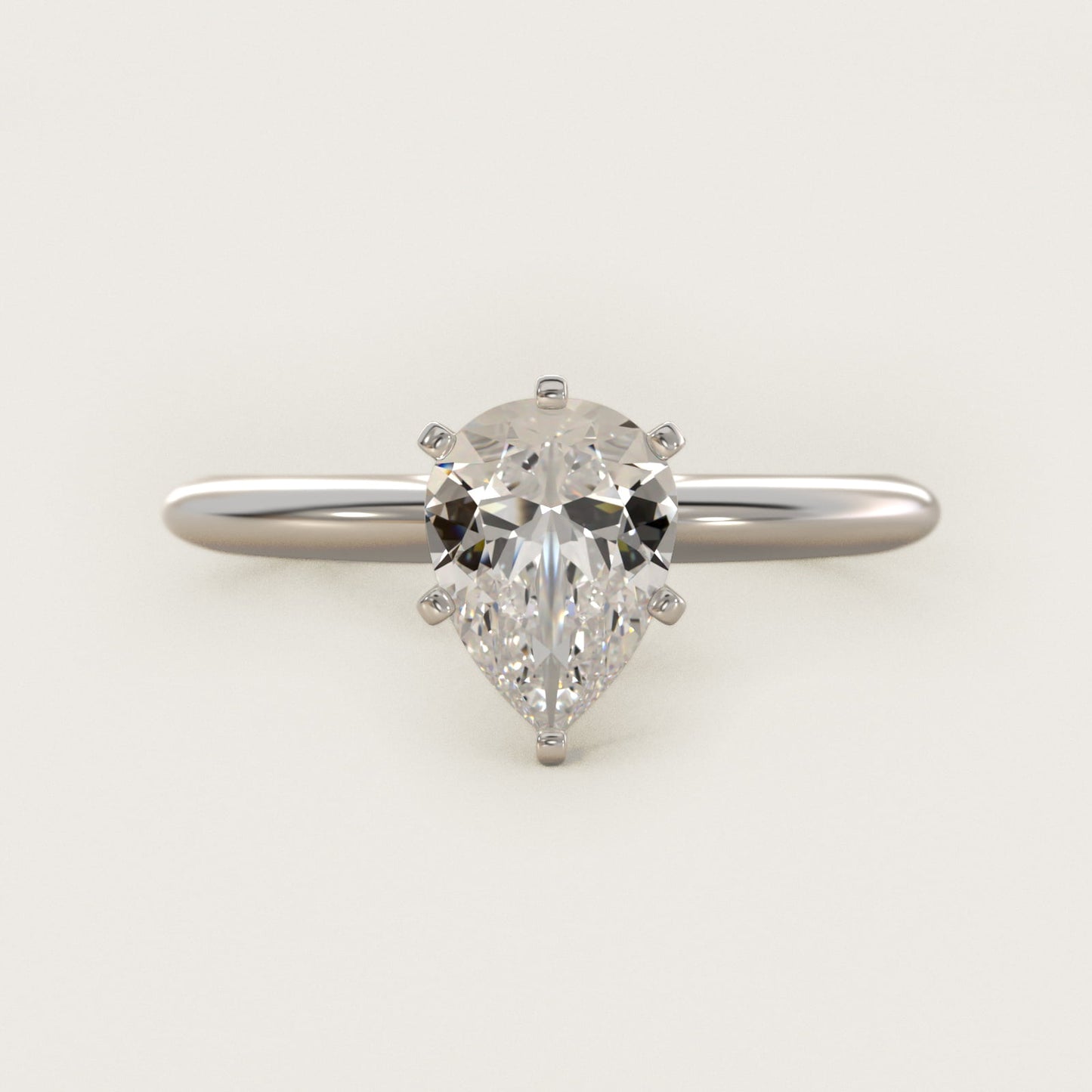 Classic Four-Prong Solitaire Engagement Ring in 18k White Gold - Pear Center