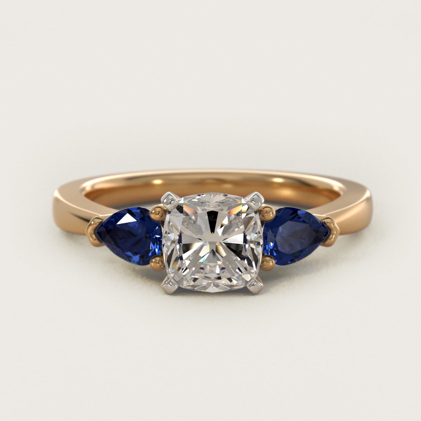 Classic Pear Shaped Sapphire Engagement Ring in 18k Yellow Gold - Cushion Center