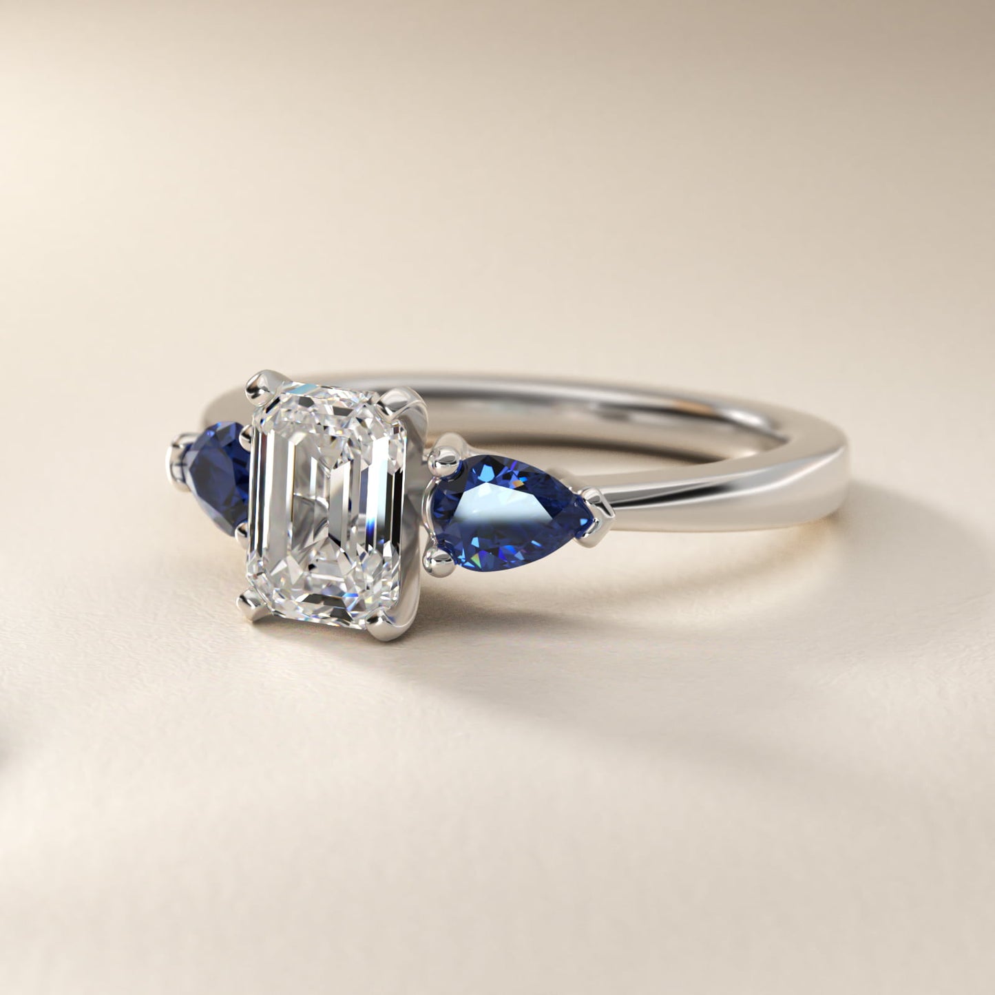 Classic Pear Shaped Sapphire Engagement Ring in Platinum - Emerald Center