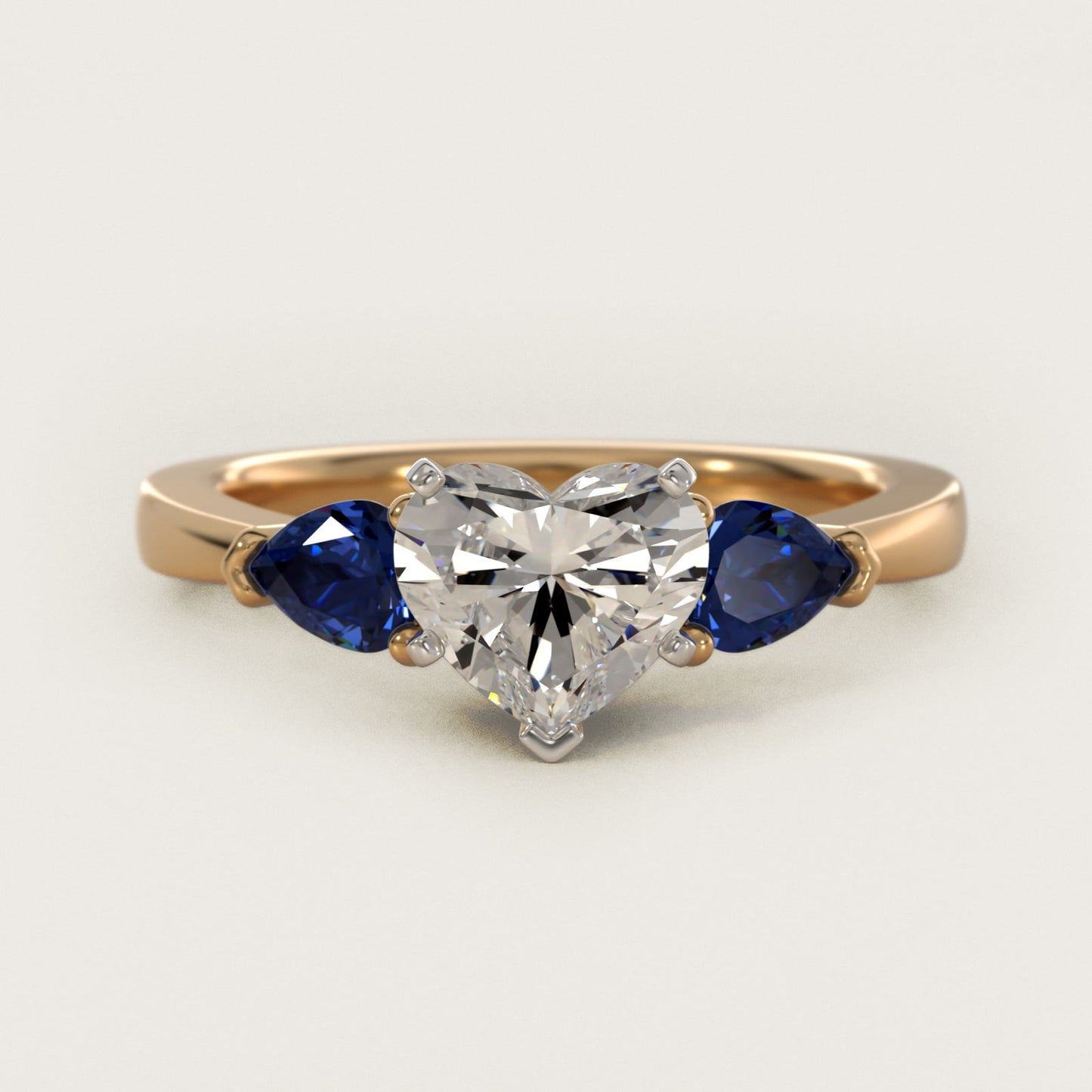 Classic Pear Shaped Sapphire Engagement Ring in 14K Yellow Gold - Heart Center