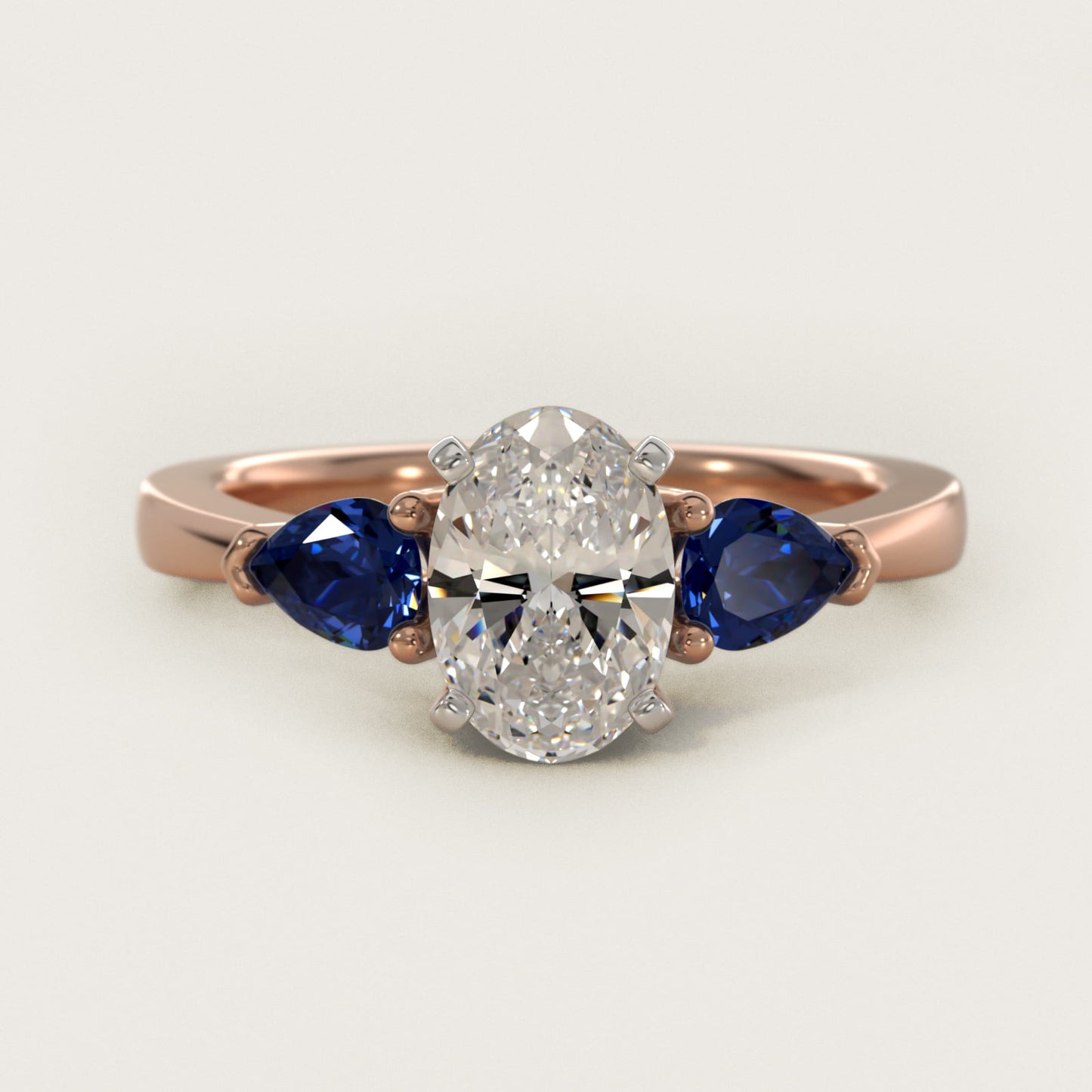 Classic Pear Shaped Sapphire Engagement Ring in 18k Rose Gold - Oval Center