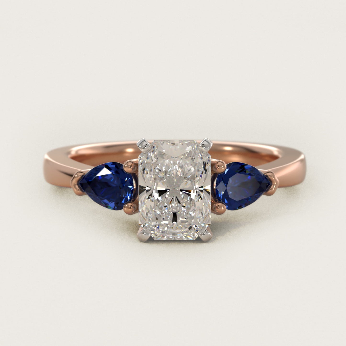 Classic Pear Shaped Sapphire Engagement Ring in 14k Rose Gold - Radiant Center