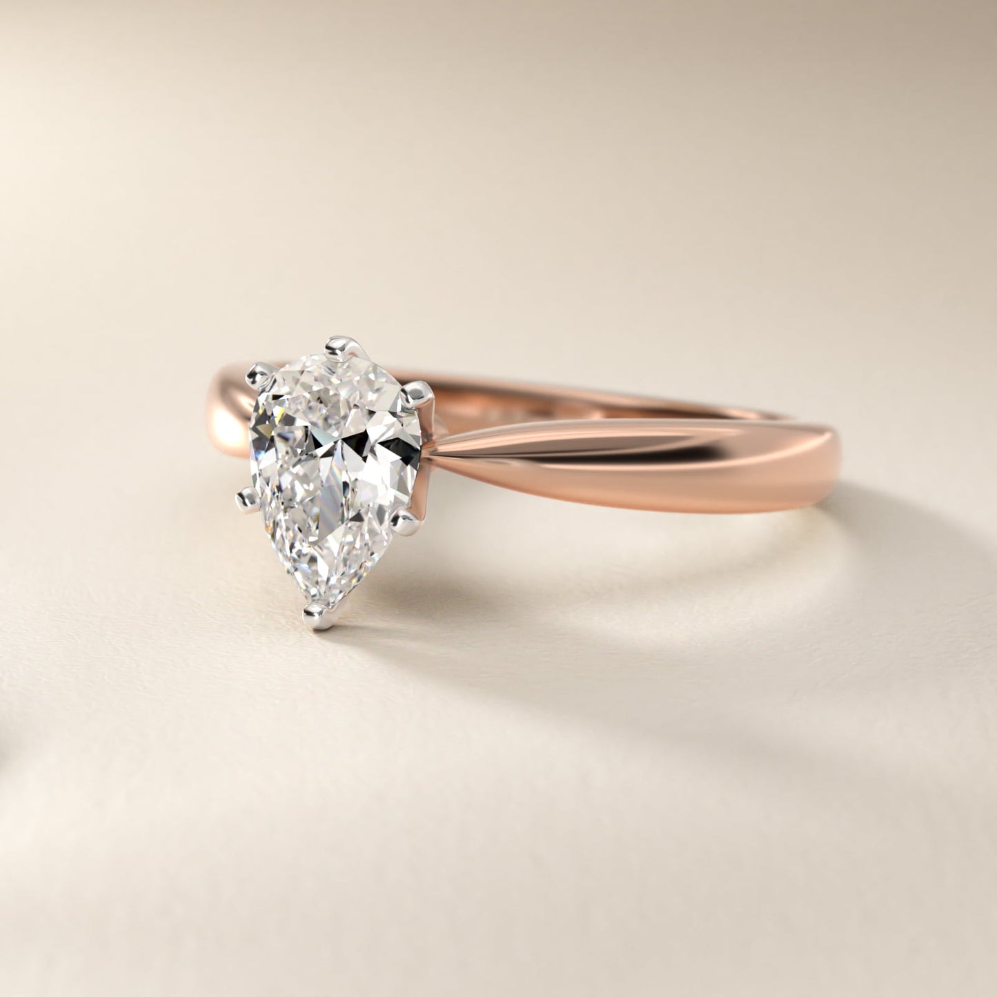 Classic Tapered Solitaire Engagement Ring in 14k Rose Gold - Pear Center