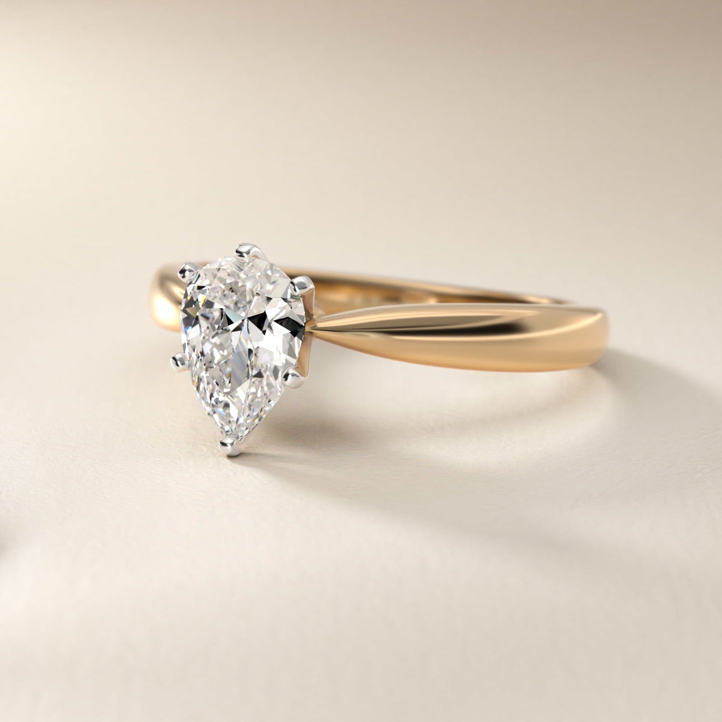 Classic Tapered Solitaire Engagement Ring in 14K Yellow Gold - Pear Center