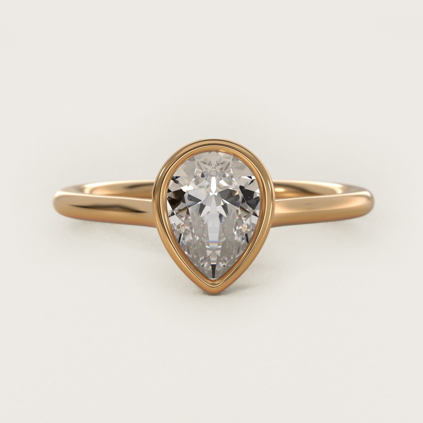 Comfort Fit Bezel Set Solitaire Engagement Ring In 14K Yellow Gold By James Allen - Pear Center