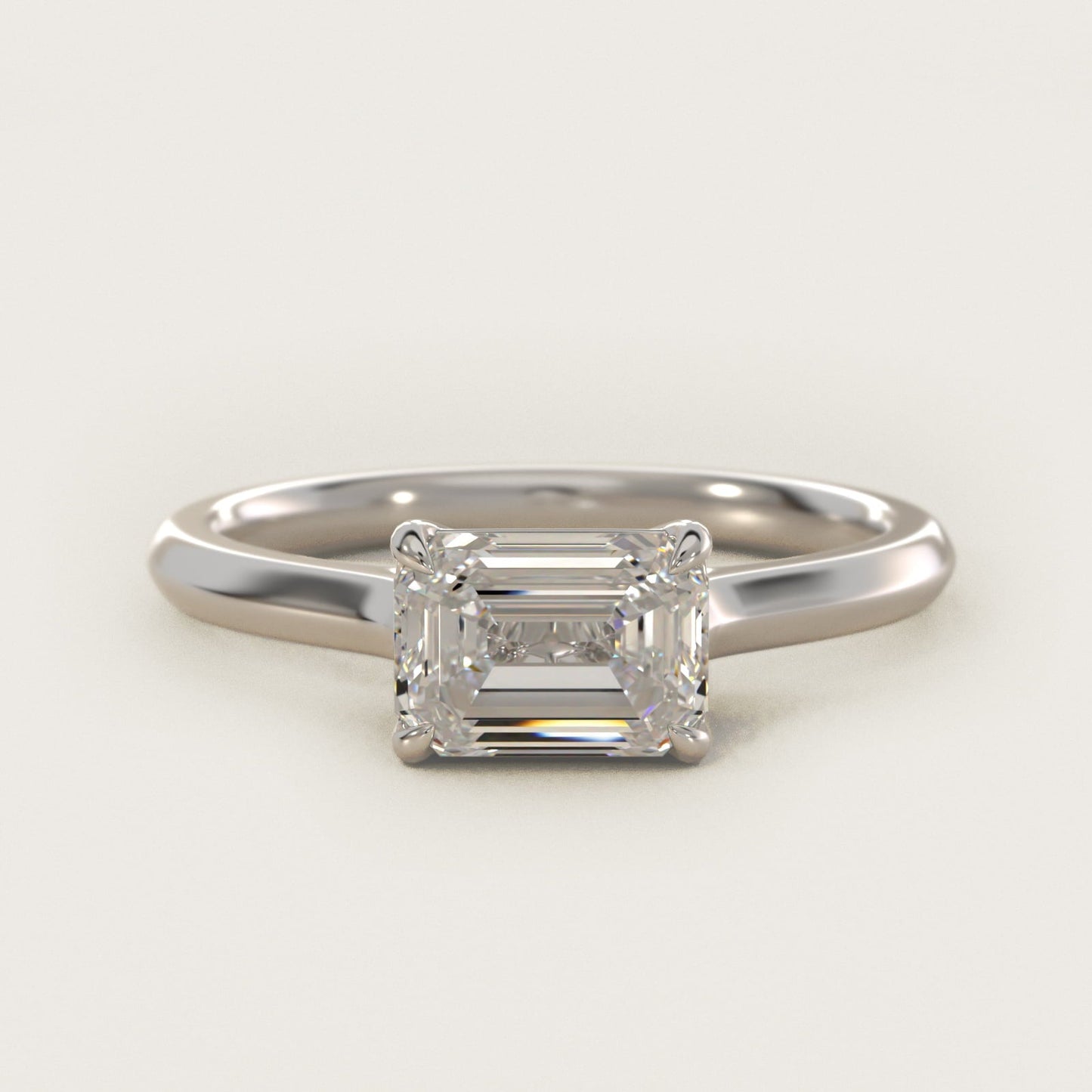 East West Solitaire in Platinum - Emerald Center