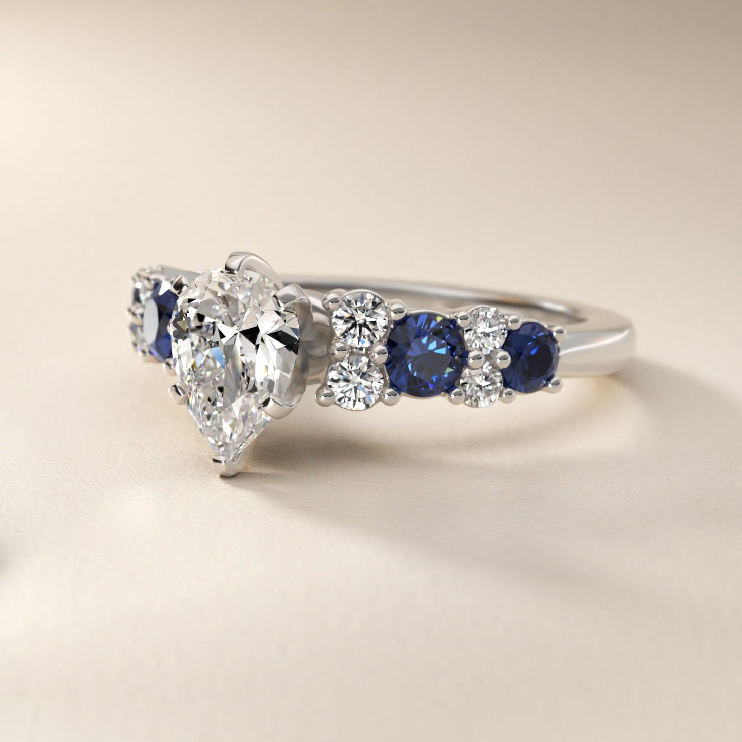 Garland Sapphire and Diamond Engagement Ring in Platinum - Pear Center