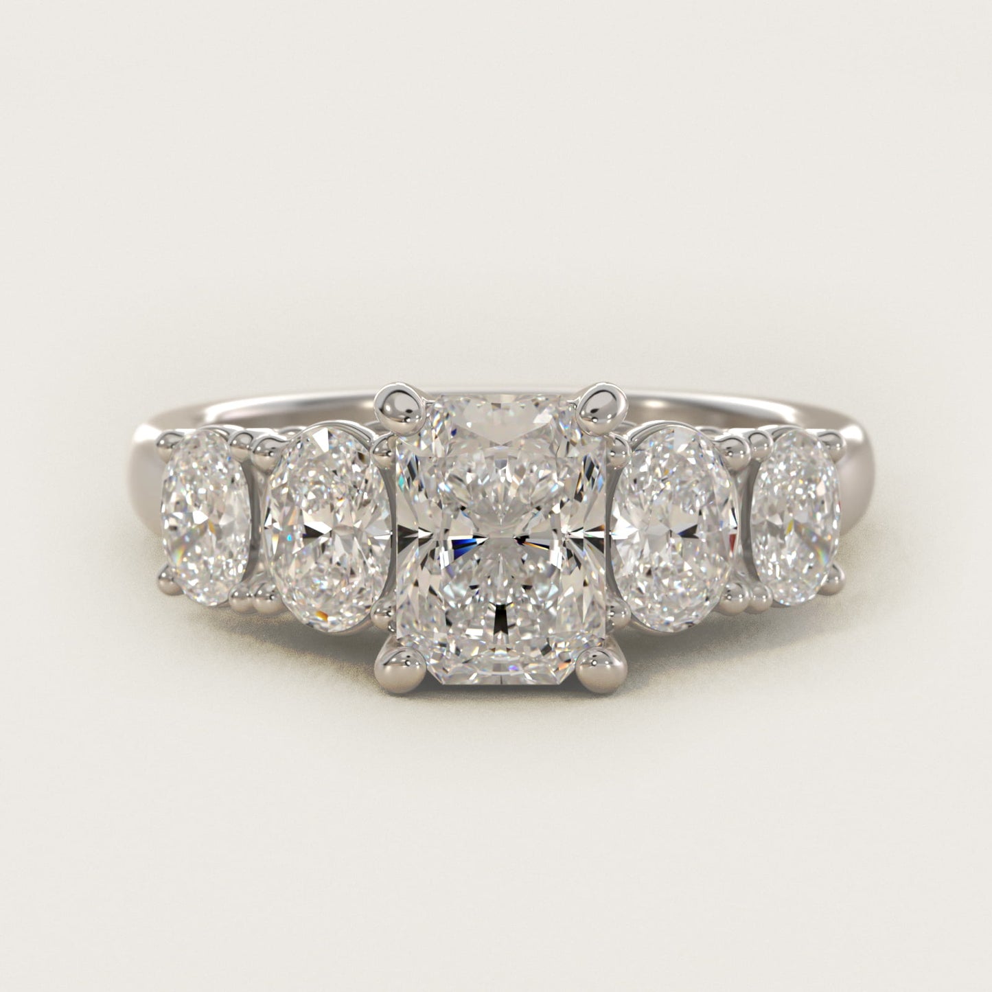 Graduated Oval Diamond Engagement Ring in 14k White Gold (1/2 ct. tw.) - Radiant Center