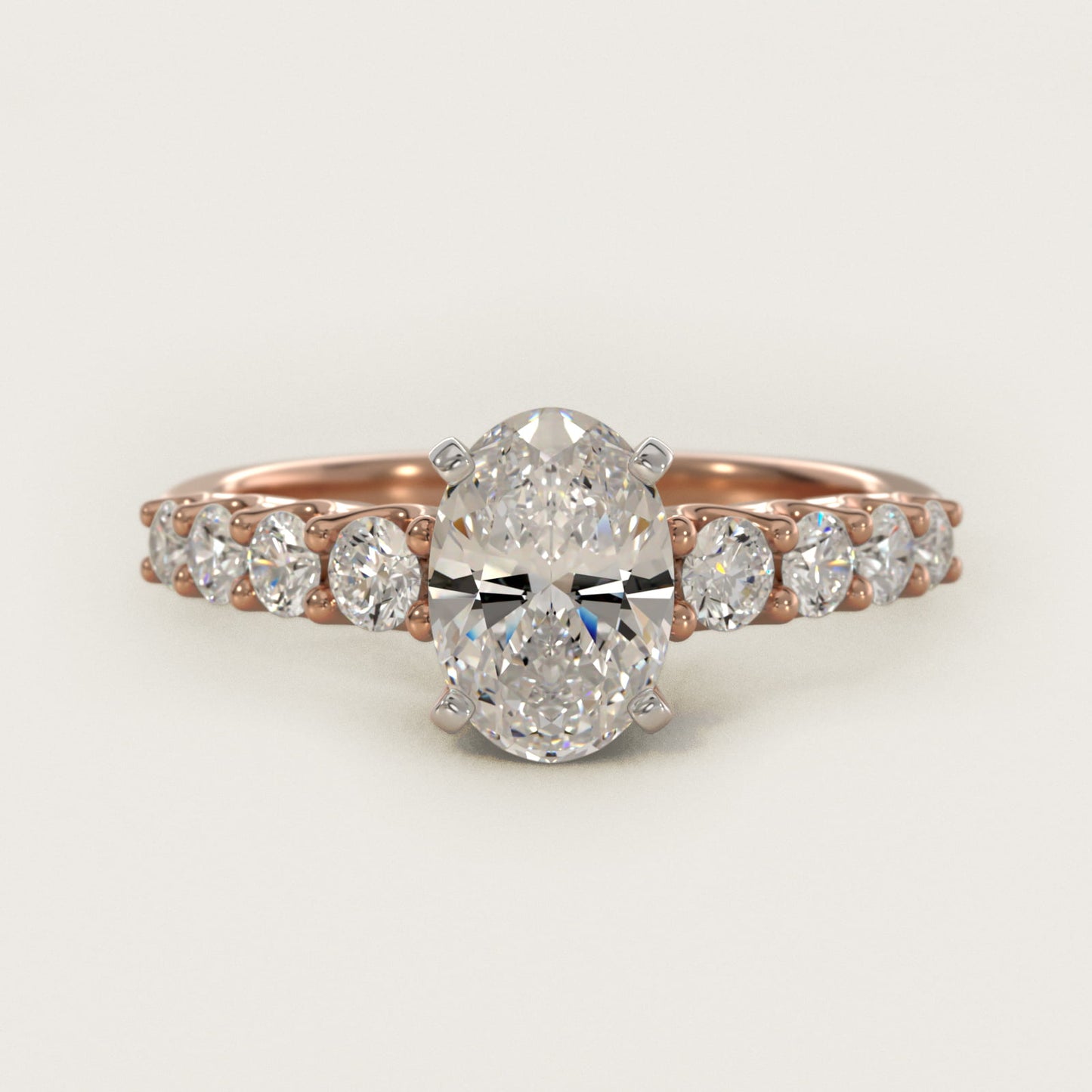 Graduated Side Stone Diamond Engagement Ring in 14k Rose Gold (3/8 ct. tw.) - Oval Center