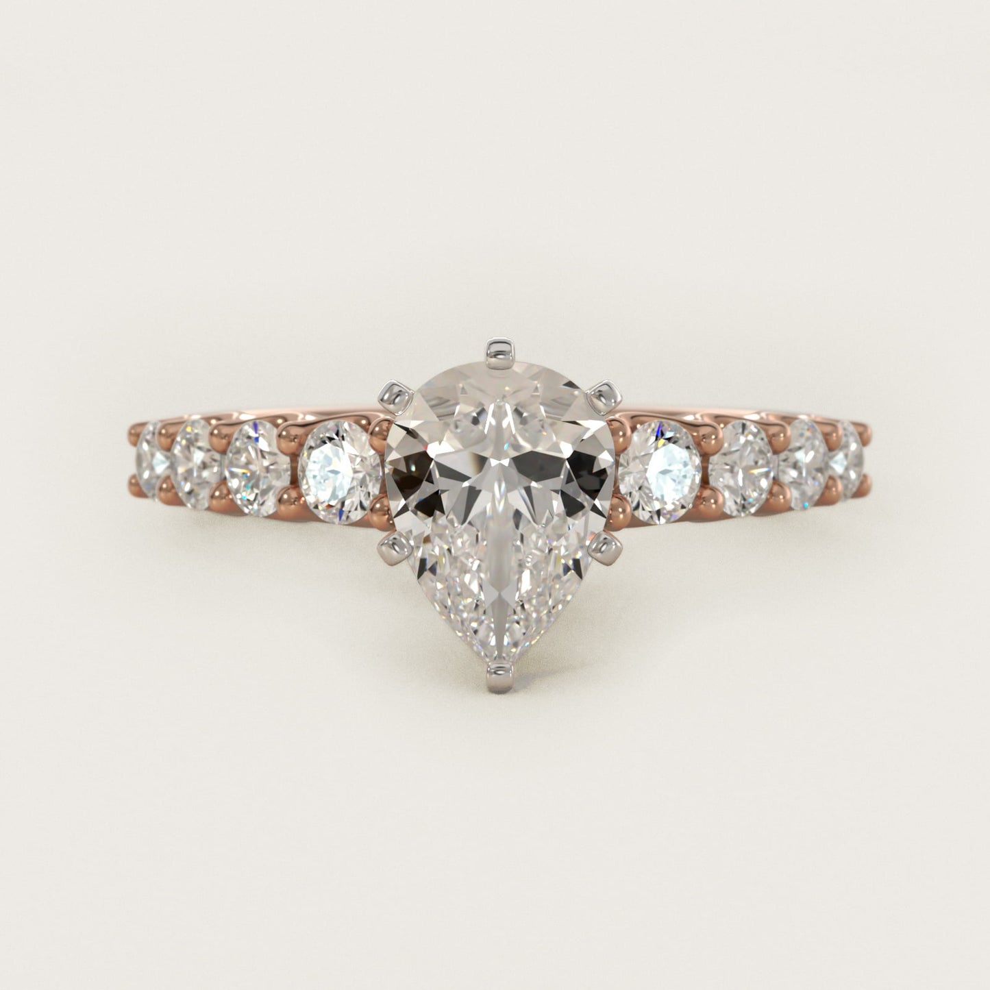 Graduated Side Stone Diamond Engagement Ring in 14k Rose Gold (3/8 ct. tw.) - Pear Center