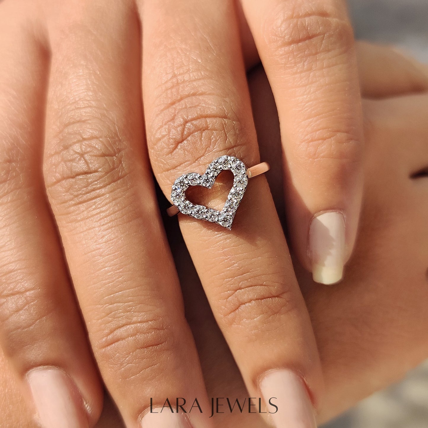Lab grown round engagement ring in Round Cut Moissanite, available in Silver. IGI certified, ethically sourced, handcrafted at Lara Jewels.